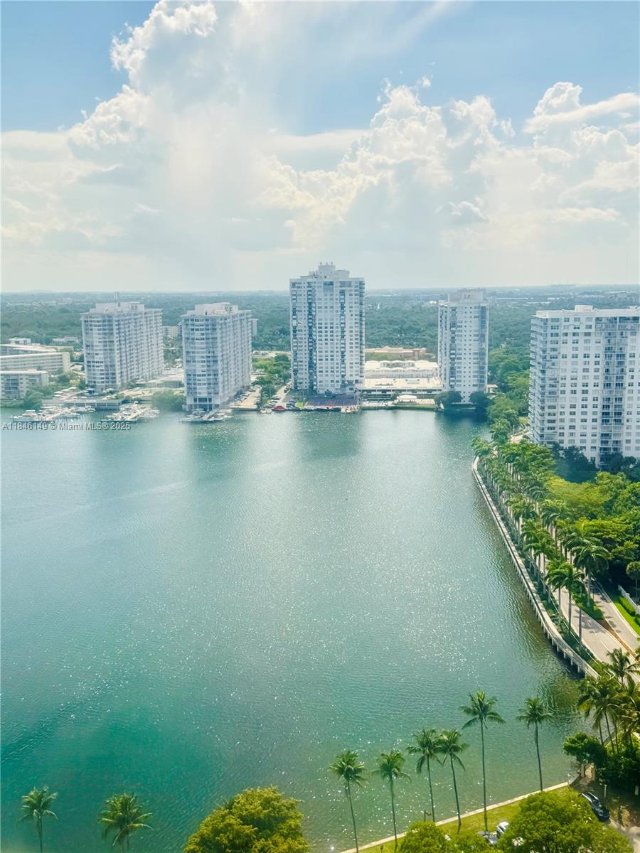 Beautiful PENTHOUSE with HIGH CEILINGS & UNOBSTRUCTED WATERFRONT VIEWS!  Large layout, private large balcony with incredible bay view of Williams Island Bay.  Home has been meticulously cared for past 22 years by same tenant!  Building amenities include: BBQ area, swimming pool, tennis, fitness center, 24-7 Security. Monthly maintenance payment includes Water/Sewer/Trash/Cable/Wi-Fi.  BEST LOCATION!!!  Building is perfectly located in the Heart of Aventura. Close to all shops including Fresh Market, Crema Cafe, Panera Bread, Olive Garden, Reunion Kitchen, Anthony's Pizza, Baguette Nir, etc. Walking trail to Williams Island Blvd!  Minutes from Sunny Isles Beach, Aventura Mall, I-95, Airport(s) and all major shopping centers & schools. A MUST SEE!