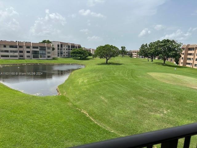 Beautiful apartment with 2 bedrooms & 2 bathrooms, overlooking the lake and the golf course in the desirable 55+ community of Sunrise Lakes Phase IV! Enjoy the convenience of a washer/dryer inside your unit! Community recreation area includes Pool, Tennis, Golf, Dance, Shows, Club house, Theater & more! Sunrise Lakes IV is in a central location close to restaurants, shopping and highways.