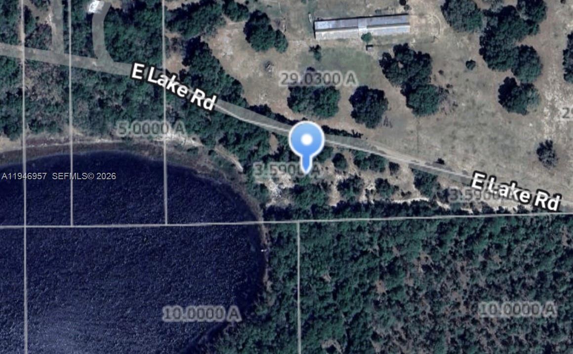 3.59 Acres of vacant land. Waterfront lake lot to build your manufactured home.