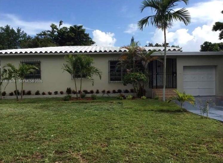 Single Family Home with Great Potential — Sold As-Is. Excellent opportunity to own a spacious single-family home in the heart of North Miami. This 3-bedroom, 2-bathroom property also features an additional room currently being used as a 4th bedroom, plus a very spacious Florida Room offering endless possibilities for entertaining, a family area, home office, or flexible living space. The home features beautiful wood flooring throughout the living room and three bedrooms, granite flooring in the Florida Room, and tile flooring in the additional bedroom. The property includes central A/C, refrigerator, microwave, and a gas stove. Situated on a generous lot, the home offers a large backyard ideal for family gatherings, outdoor enjoyment, or the future addition of a pool. The property also includes a one-car garage and an extended driveway with ample parking for multiple vehicles. Conveniently located near I-95, Biscayne Blvd, Aventura Mall, Barry University, shopping centers, restaurants, and just minutes from the beach. While the property may require updates and modernization, it presents an excellent opportunity to personalize and add value. A true diamond in the rough with incredible potential for homeowners or investors alike.