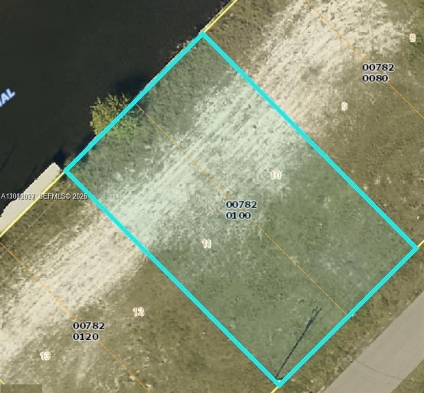 Imagine building your dream home on this exceptional 10,019 sq. ft. Gulf-access lot, already equipped with a seawall for effortless boat docking and unparalleled waterfront living. Nestled in a highly desirable, well-established neighborhood, this rare opportunity offers immediate access to the Gulf of Mexico, allowing you to enjoy the water in just minutes. Experience the best of coastal life with boating, dining by the water, boutique shopping, and endless outdoor activities—all within easy reach. This prime lot is your canvas to create a personal oasis in a vibrant and flourishing community. Seize this chance to turn your vision into reality and secure your waterfront paradise today!