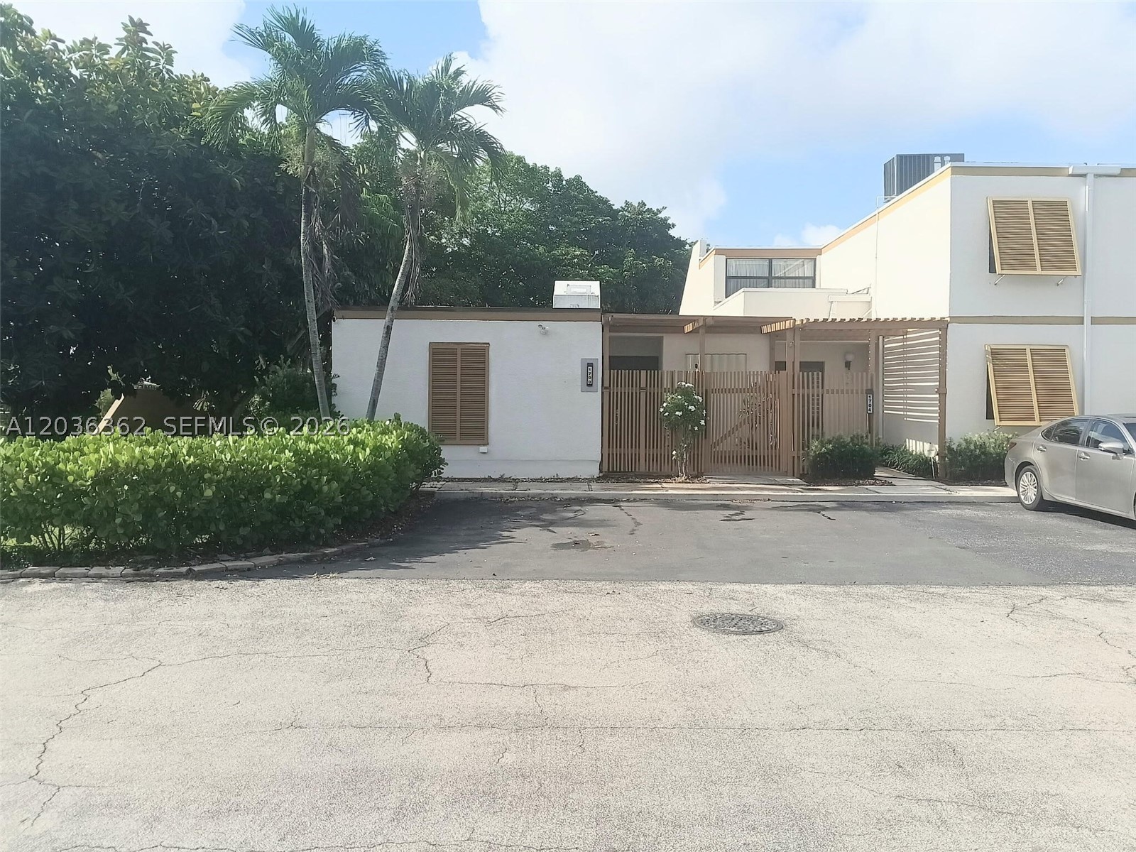 Welcome to this updated townhouse located at 1700 SW 131st Place Cir S, Miami, FL 33175. This updated property has a comfortable and inviting living space. The townhouse features a functional layout that maximizes the use of space, providing both comfort and utility. It shows as a 2 bedroom plus DEN; but DEN can be easily converted to a 3rd bedroom with ample closet.The home boasts a center atrium which brings in natural light, creating an inviting atmosphere. Its located on a prime corner lot with no back neighbors and large side area with beautiful hedges to complement landscaping. A new roof was installed in 2025 as well as beautiful floors throughout. Located in a vibrant area of Miami, this property provides easy access to local amenities and attractions.