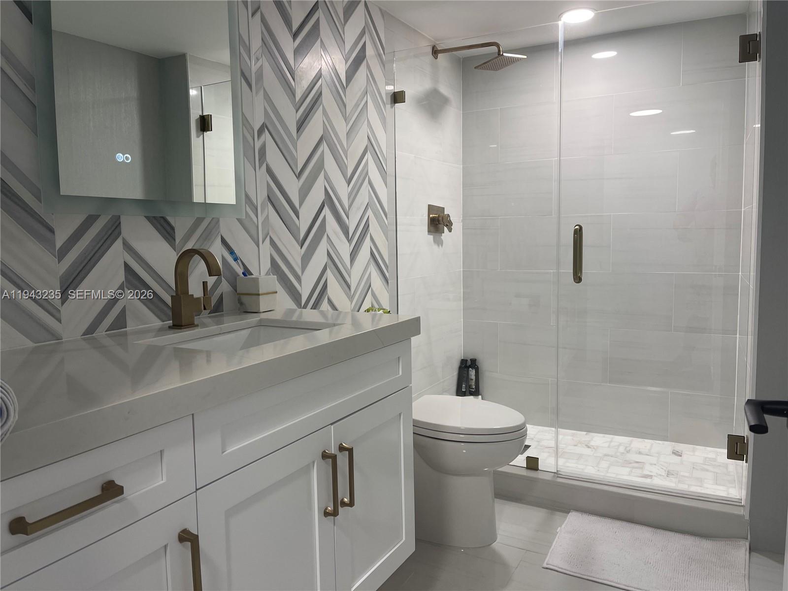 WOW WOW WOW! Live the good life in this High-end completely renovated beachfront unit boasting Direct Ocean Views, Hurricane Impact Windows, new bathrooms, new kitchen, new flooring, top-of-the-line finishings, and MORE!!! Building was also renovated with new lobby and hallways for a modern look. Located just steps from glamorous Lincoln Rd. and Ocean Drive in the family-friendly heart of South Beach directly behind the Miami Beach Boardwalk on the world-famous collins ave and 25 st. Amenities include private beach access, heated pool, BBQ area with gazebos, 24/7 manned security, Concierge, Gym, and all the fun you could want!! Don't miss out!