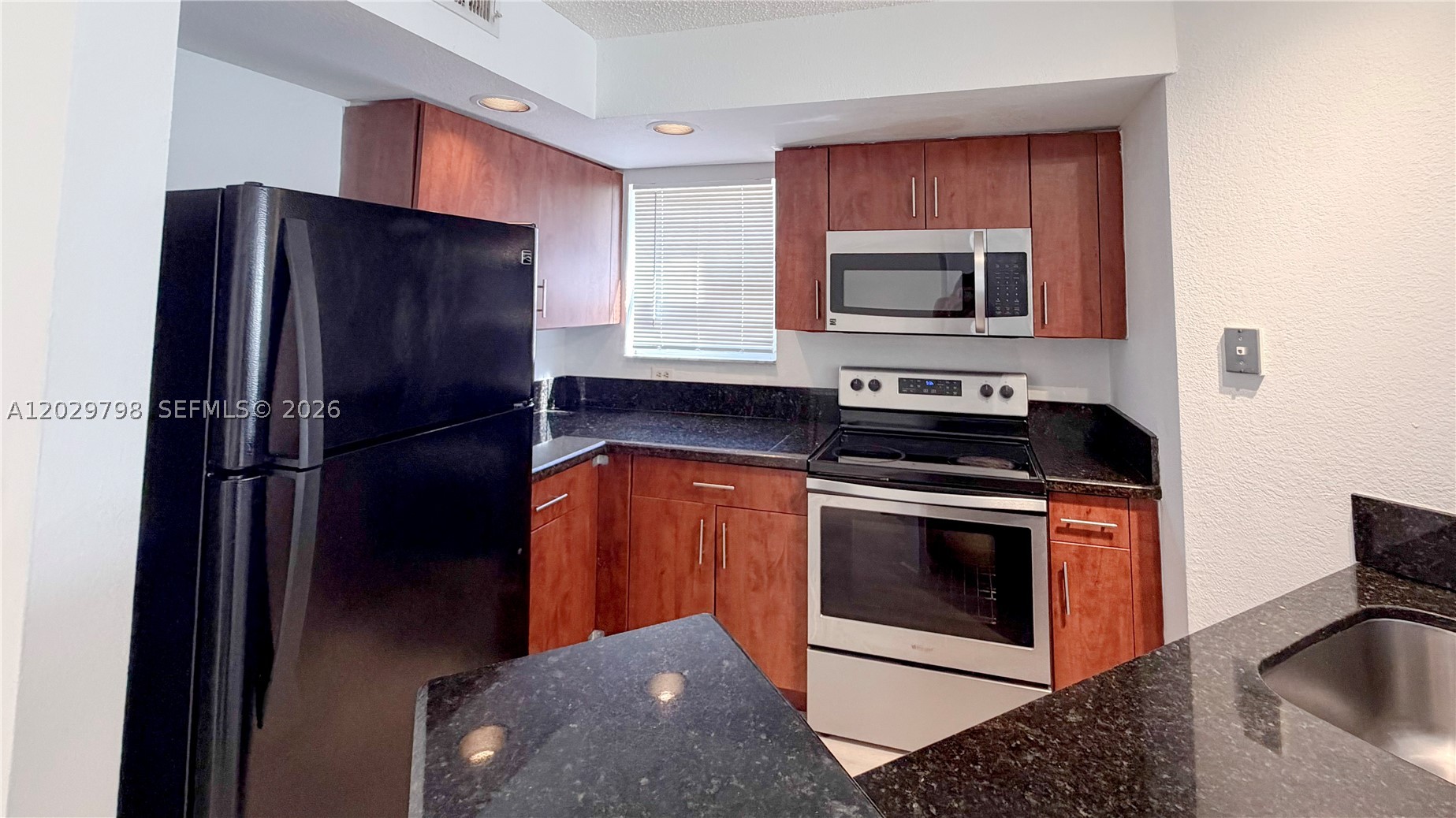Beautiful 2-bedroom ground-floor condo in Isles at Lago Mar. This well-located unit offers peaceful lake views and is situated toward the end of the community, providing a quiet setting. Enjoy the convenience of nearby guest parking and one of the community pools just a short distance away. The ground-floor location offers easy access with no stairs. Conveniently located near shopping, dining, parks, major highways, and everything the area has to offer.