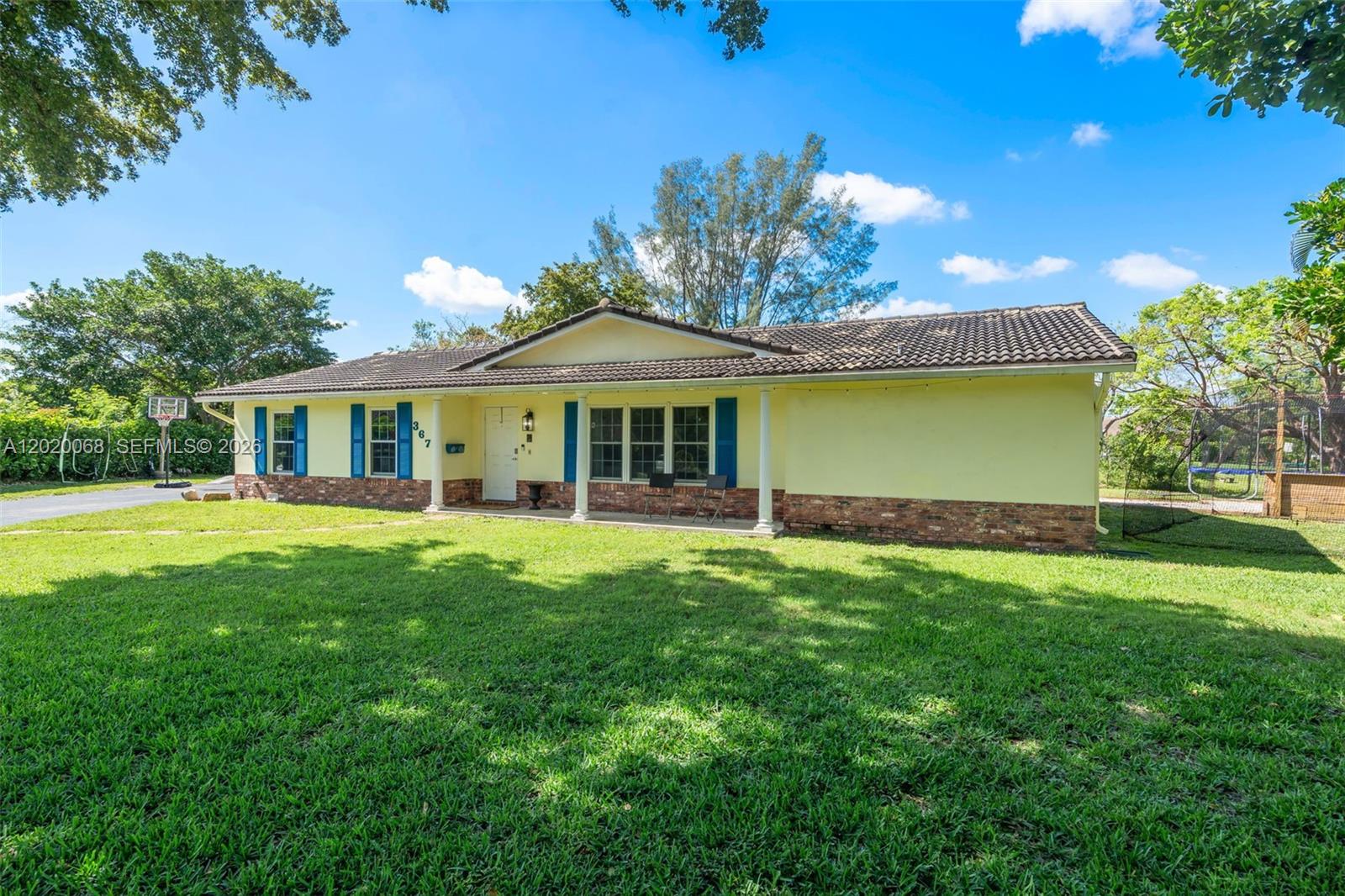 Tucked away on a quiet cul-de-sac in the highly desirable community, this waterfront pool home offers privacy,
space, and beautiful water views on an expansive oversized lot. This well-maintained single-story residence
features a bright and airy split-bedroom layout filled with natural light, spacious living areas, and inviting indooroutdoor living spaces.The family room showcases charming wood beam ceilings and opens to the kitchen and pool
area, while large windows throughout the home capture peaceful water views from multiple rooms. Step outside
to enjoy your private backyard retreat featuring a sparkling pool, generous patio space, and serene canal frontage
surrounded by lush landscaping. Additional highlights include impact windows, accordion shutters, a spacious 2-
car garage, dedicated laundry room, and a large driveway with ample parking. Ideally located near parks,
shopping, dining, and everything Coral Springs has to offer. A rare opportunity to own a spacious waterfront pool
home in one of the area’s most sought-after neighborhoods!