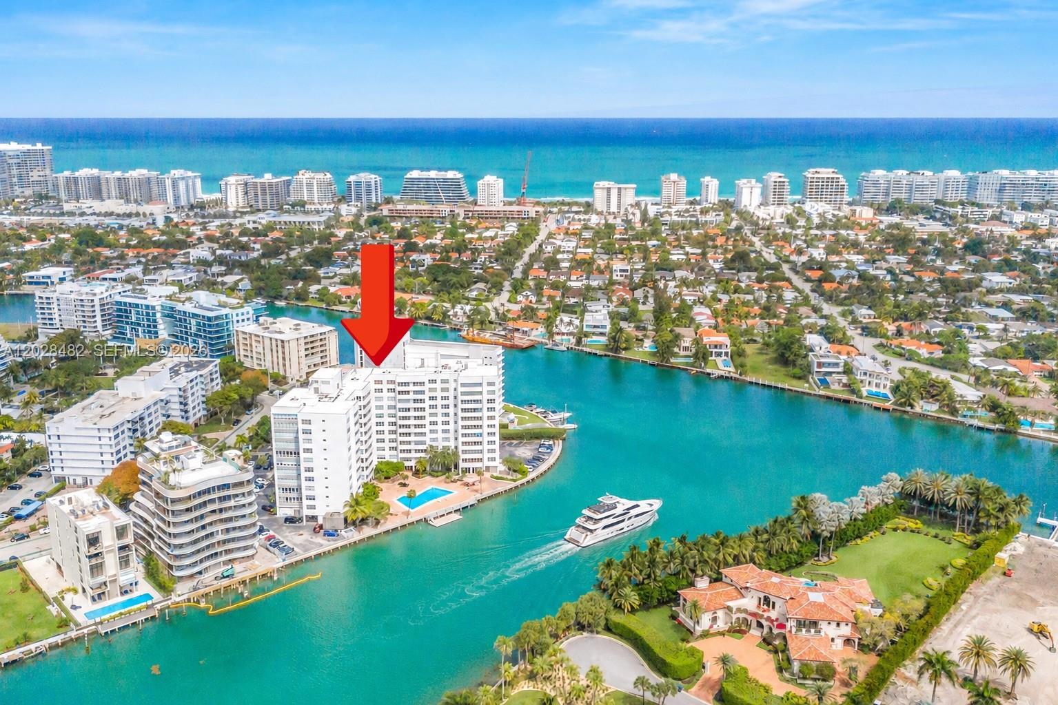 Direct, unobstructed waterfront views stretch room-to-room across Biscayne Bay and Indian Creek, the famed “Billionaire’s Bunker Island.” Spacious 1-bedroom + den / 1.5-bath residence easily-affordably can convert to a 2-bedroom.
The iconic mid-century modern Blair House delivers luxury and functionality, 9-foot ceilings, new high-impact windows, $15,000 smart WiFi window treatments, sweeping bay, golf course, and outstanding sunset views, yacht’s afloat . The kitchen flow and space a chef would approve. The oversized walk-in closet designed for an expansive wardrobe, wildly accessorized spa-inspired primary bath, walk-in storage on the same floor, and a dedicated laundry area shared by only 2 units, easy conversion w/d within unit.
This intimate 80-residence building delivers privacy of only (4 units per floor). Completed $4M in upgrades plus 50-year recertification/SIRS compliance. Amenities include a seasonal heated pool, fitness center, kayak, bike and paddle-board storage, private floating dock/launch pad, door attendant, no fixed bridges for visiting boater access.  Enjoy a walkable lifestyle near beaches, Bal Harbour Shops, endless dining, Starbucks, houses of worship, A-rated K–8 schools, a family water park, and dog park. Full-service amenities include doorman, onsite manager, engineer, parking, reserves, A/C in HOA dues, and pet-friendly living up to 20 lbs.