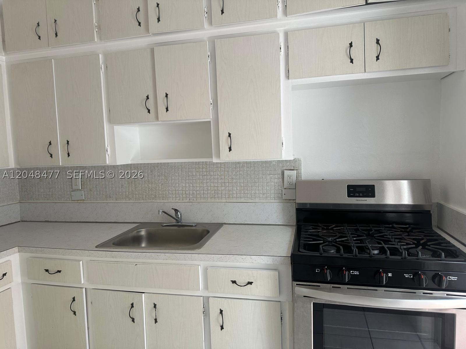 AMERICAN GARDENS CONDO - Residential Lease