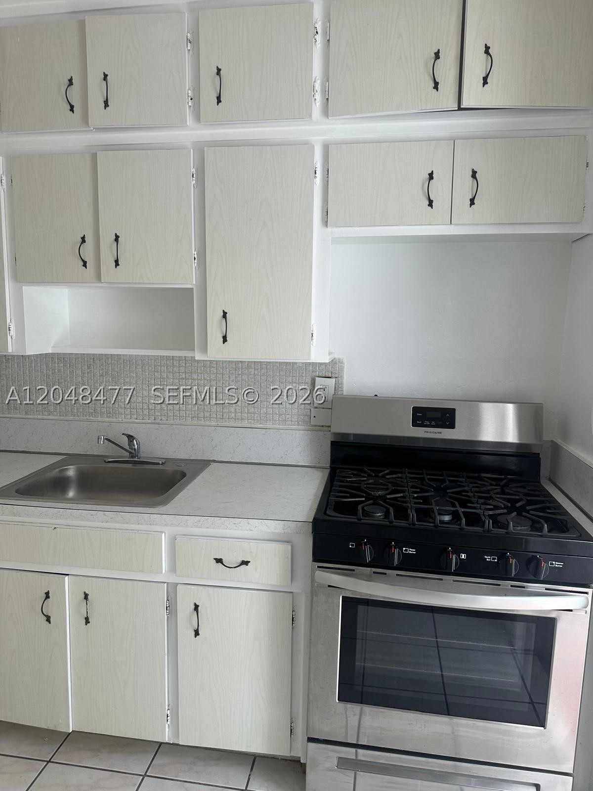 AMERICAN GARDENS CONDO - Residential Lease