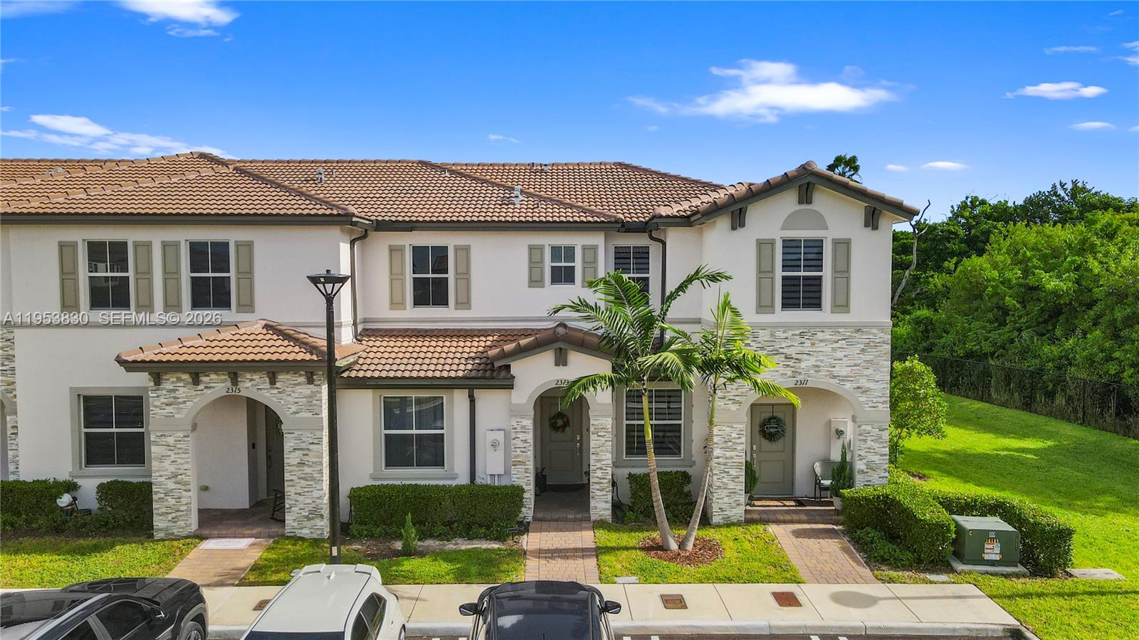 Motivated Seller / Welcome to a gem in the new construction 2023 Lennar community Westview, Miami. This upgraded townhouse offers 3 bedrooms plus a den, and 3 bathrooms, boasting 1,373 sq ft of living space. The home is accented with high-quality finishes and impact windows, creating a bright, welcoming atmosphere. Enjoy the relaxing water canal view from your newly updated patio, complete with a covered pergola for shade on sunny days. This move-in-ready home includes two parking spots in a gated community with 24/7 security for peace of mind. Conveniently located near major highways, Westview combines tranquility with easy access to city life. Don't miss this opportunity to make this stunning property your own!