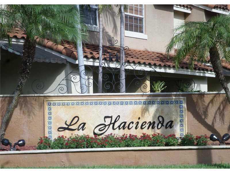 Great Unit in a nice gated Community, very convenient location, located in a great school district, mayor highways and shopping centers, community offers club house, tennis, pool, gym playground and more. Green wall in the picture already painted all in w hite. Den could be converted to 2nd bedroom.
