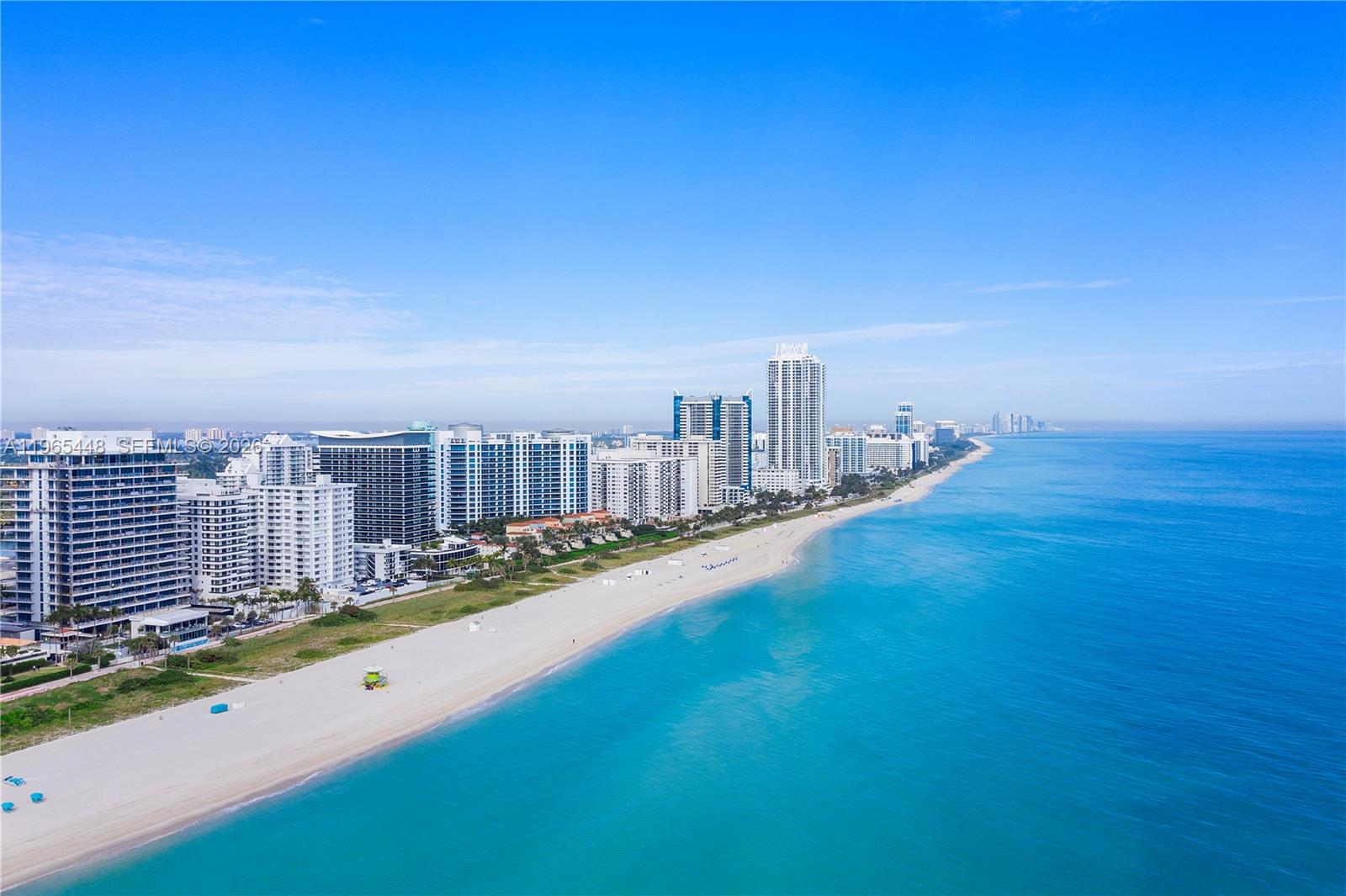 DON'T MISS this excellent investment opportunity on Millionaire's Row! Completely remodeled with 1 bedroom and 2 converted dens, turn-key furnished and ready for short term rentals right away! New hurricane windows and doors already in place. Spacious balcony with intracoastal views. Amenities include valet parking, large heated pool, gym, picnic & BBQ area right on the beach! Association fee includes cable, internet and air conditioning.