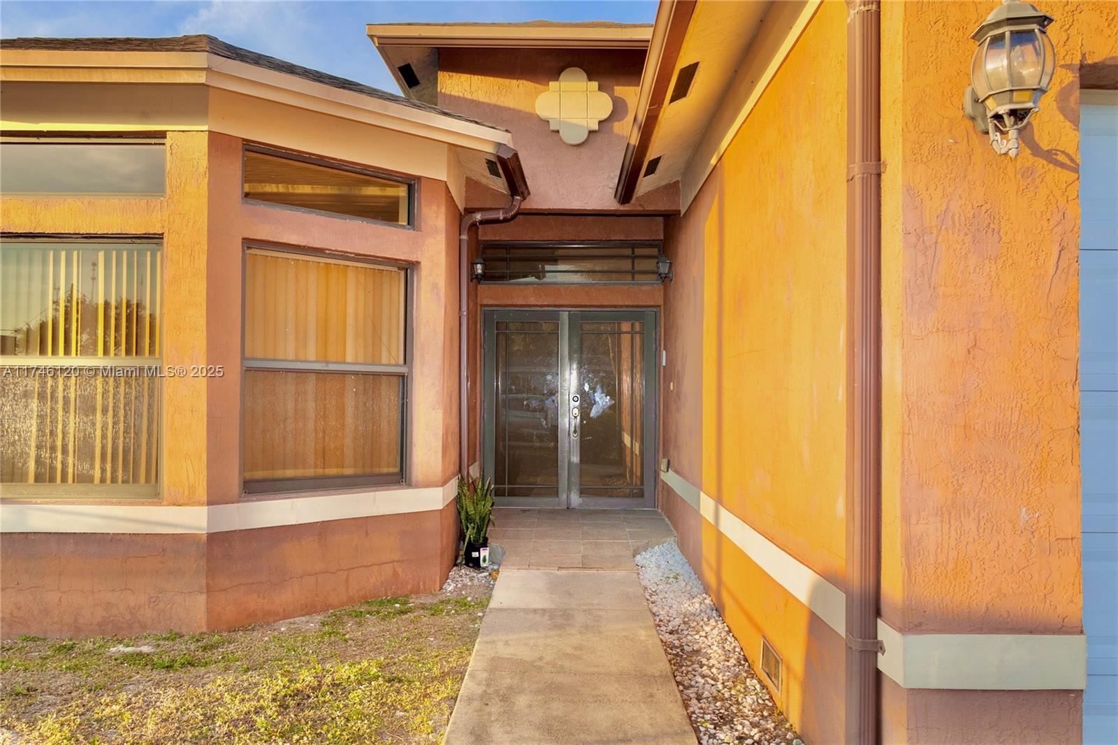 Welcome Home to this Stunning Gem in West Park, Florida! Nestled in a rapidly growing community this beautiful 3-bedroom, 2-bathroom home offers the perfect blend of comfort and convenience. No HOA means more freedom, and you're just minutes from Hard Rock Stadium, major highways, and Hollywood Beach. Inside, you'll find a meticulously maintained home featuring wood kitchen cabinets, tile and vinyl flooring, and a spacious den perfect for relaxation or entertainment. The master bathroom boasts his-and-her sinks, a walk-in shower, and a luxurious whirlpool jet tub/shower combo. Sitting on a spacious lot, the gated backyard provides privacy and ample outdoor space. This Move in Ready home still has plenty of potential to make it your dream home. Don't miss out on this fantastic opportunity!