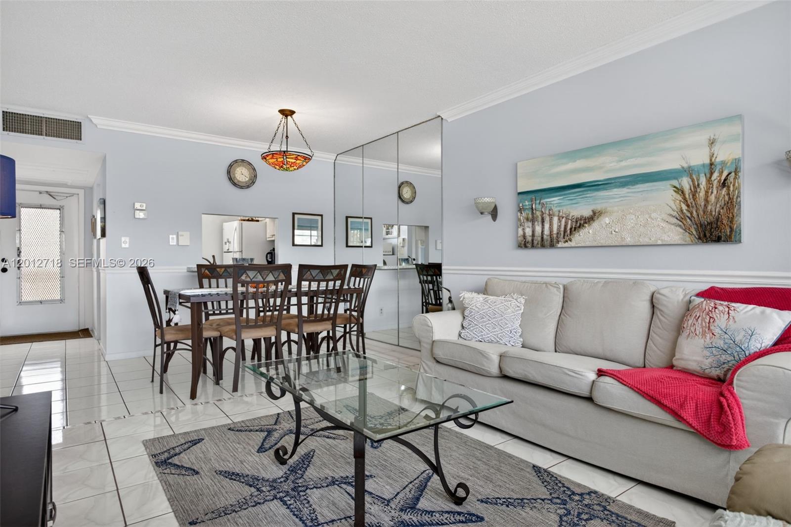 Charming and beautifully maintained 1 bedroom, 1 bathroom condo sold completely furnished and turnkey in the desirable Lauderhill East HOPA community. This bright unit features tile flooring throughout, a king-size bed, extra-large closet, and a screened balcony perfect to enjoy your morning coffee. Tastefully decorated with beach-inspired décor, this unit offers comfort and style throughout. Impact windows, 50-year recertification completed, roof only 4 years old, A/C and water heater replaced 4 years ago. Well-maintained and truly move-in ready. Enjoy resort-style amenities including 2 pools, BBQ area, gym, clubhouse, billiard room and a 9-hole golf course. Easy to show!