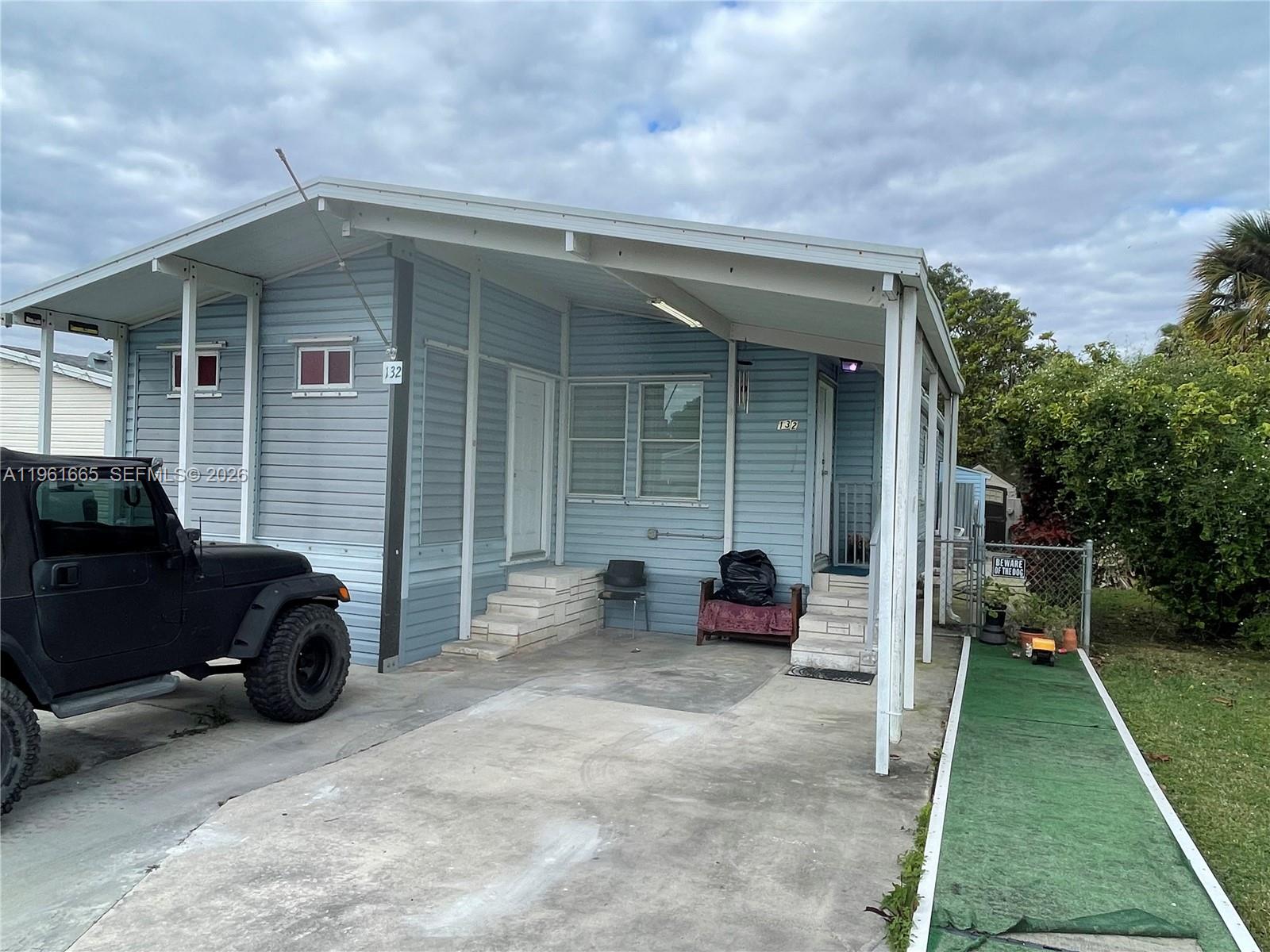 JUST LISTED 3 BEDROOM 2 BATH MANUFACTURED HOME IN AMERICANA VILLAGE GATED COMMUNITY.THIS HOME IS RIGHT CLOSE TO ENTRANCE OF COMMUNITY MAKING IT A VERY DESIRABLE UNIT. HOME HAS LAMINATE FLOORING THROUGH OUT ,UPDATED KITCHEN CABINETS WITH GRANITE COUNTER TOPS ,STAINLESS STEEL APLIANCES AND UPDATED BATHROOMS .THIS UNIT ALSO HAS PARKING UNDER ROOF AND YES LAND IS INCLUDED WITH THIS SALE.(YOU OWN THE LAND).LOW MAINTENACE INCLUDES WATER AND GARBAGE PICK UP.
EASY TO SHOW PLEASE USE SHOWING ASSIST.
"WATER FILTER IS NOT INCLUDED IN SALE"