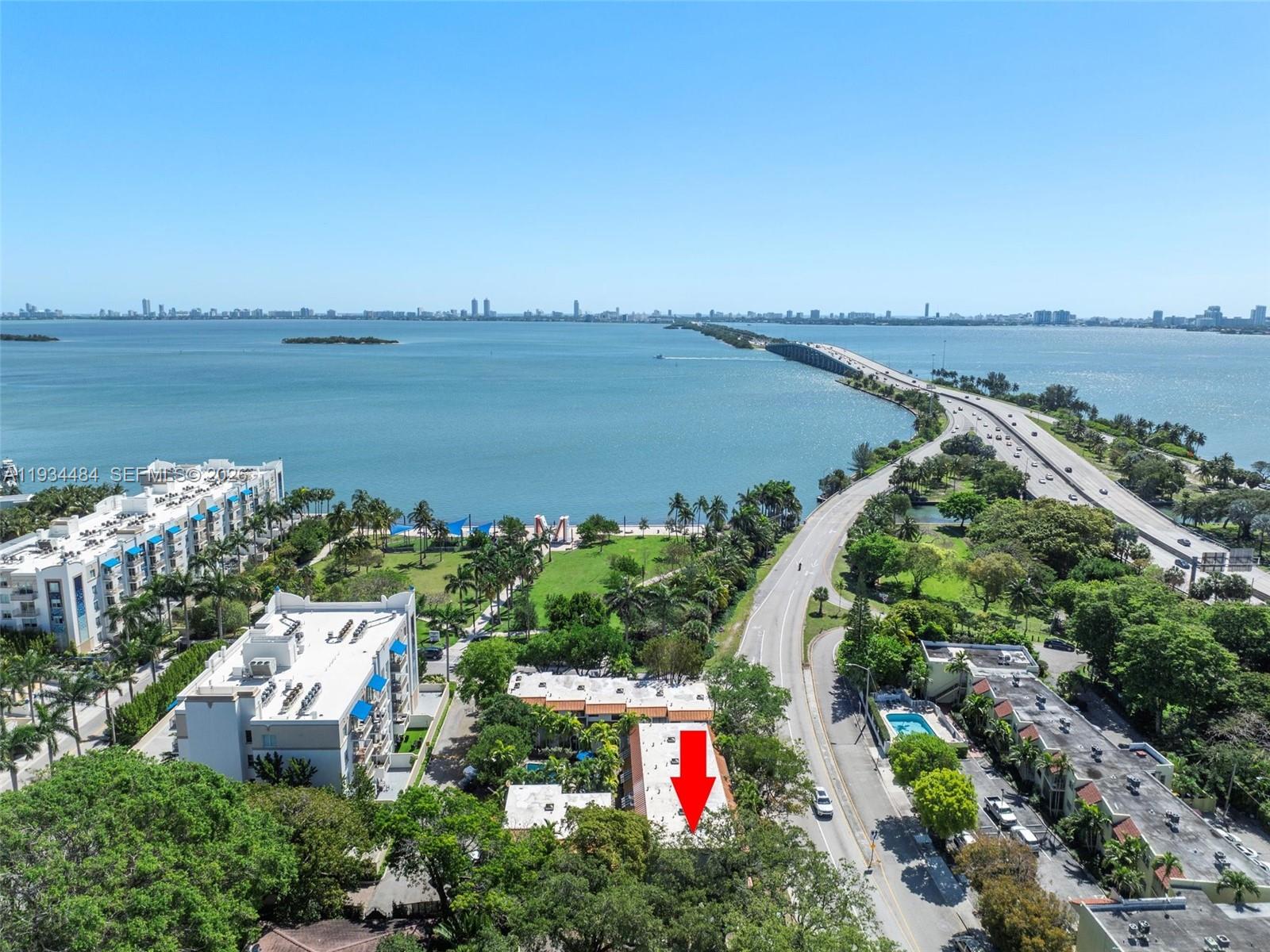 Fantastic opportunity to own a beautifully remodeled townhome in a charming community in between Edgewater & The Design District. This two-story gem has been totally remodeled with ultra-modern bathrooms and an open kitchen featuring honey gold warm wood cabinets & SS appliances. Sliding glass doors lead to a private outside back patio where you can barbecue as if you are in your own private home. The second floor is a two-bedroom split plan. Amenities include a large tropical pool & plenty of parking. One block from the Bay & park and within a short walk to all the local shops & restaurants in The Design District and Midtown. Set within a boutique complex of only 17 units, the property provides a sense of privacy while remaining close to all major roadways and vibrant city amenities Miami has to offer. Enjoy the perfect lifestyle with none of the issues of high-rise condo living. Perfect as a primary residence or a smart investment, with strong rental appeal thanks to its excellent location.  EASY TO SHOW.