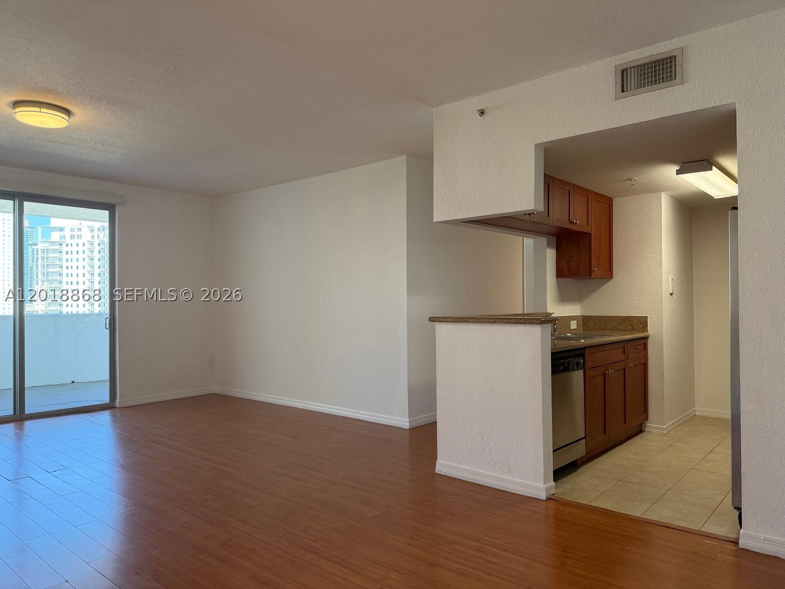 Spacious and bright 2/2 at 36 NW 6th Ave, unit 1108. This apartment features elegant laminated floors and a unique wraparound balcony with breathtaking views of Downtown Miami, Brickell, and the Miami River. Open Layout with floor-to-ceiling windows, modern kitchen and abundant natural light. Prime location just minutes from Brickell, Downtown, and mayor highways. Enjoy full-service amenities including pool, gym and 24-hour security.