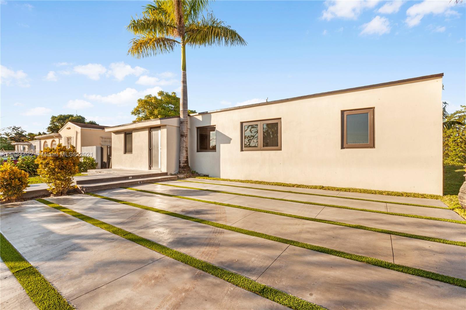 Everything new on this turn-key house! Centrally located, fully furnished 4 beds home features top of the line kitchen appliances, impact windows, recessed lights and spacious closets. Master bathroom contains a floating toilet bowl and ceiling double showers.  Swimming pool 22X12 with a large outdoor kitchen. Large laundry room w storage & sink. Main home boasts +- 1,800 Sq.Ft. while the auxiliary house is just shy of 1,000 Sq.Ft (use as office, in-laws quarters or 2 1/1s income producing apartments). The outside landscaping has also been entirely done featuring lush green grass, aluminum gates and stain concrete driveway. 5 min to Coral Gables, 10 min to Brickell, 5 min to MIA, 10 min to South Beach. Live and play or buy as an income producing property.
