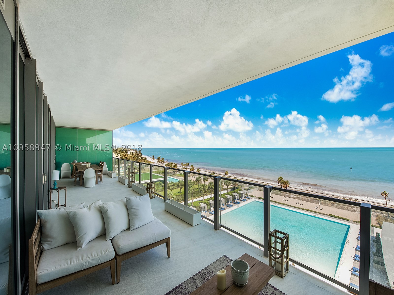 Situated oceanfront on the island of Key Biscayne, this opulent flow-through residence at the esteemed LEED-Certified Oceana offers the ultimate beachfront living experience in an idyllic setting with 500 FT of private beachfront & 5-star resort-style amenities. A private elevator leads you into this lavish 3-Bed + Convertible 4th + Staff Quarters, 5.5-Bath unit offering marble flooring, 10' ceilings, floor-to-ceiling windows, expansive chef's kitchen with Miele appliances, formal dining room & 892 SF of private terraces with direct-ocean views. Amenities include tennis court, poolside restaurant, oversized relaxation pool, lap pool, sand volleyball, media room, oceanside fitness center, spa services and kids play room. SALE INCLUDES 2 STORAGE SPACES AND 3 PARKING SPACES.