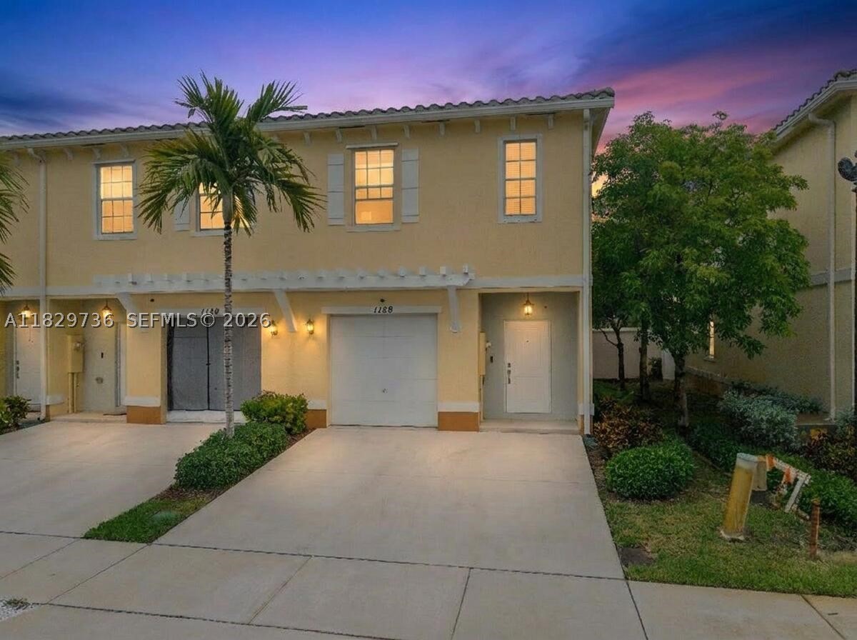 Newly Constructed Townhome Built By DR Horton In 2019. This Beautiful 3 Bed /2.5 Bath Corner Unit With Garage Is Situated On A Peaceful Private Street! This Home Features An Open Floor Plan With Over 1700 Sq Ft. Upgraded Kitchen With Granite Counters, Stainless Steel Appliances. Lots of Cabinet Space And A Pantry. Tile Floors. Full Size Washer/ Dryer.  Screened Patio. 1-Car Garage Plus 2 Parking Spaces. Full Hurricane Protection. This Gated Community Has A Pool, Clubhouse, Children Playground & More. Low HOA Fee Only $197 Per Month. FHA/VA APPROVED! PRIME LOCATION: Walk to Lauderhill Mall, Central Broward Regional Park, Water Park. Live Next To America's ONLY ICC-Certified International Cricket Stadium! T20 World Cup 2024 Was Played Here.  Great For An Owner Or Investor! Can Lease Right Away!! Corner Units Rarely Available! Schedule Your Tour Today!