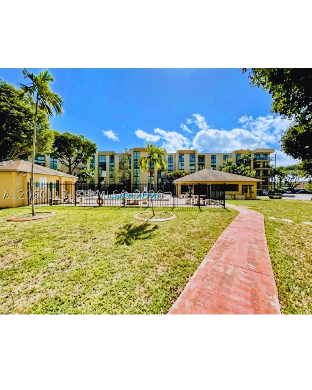 Welcome to this well-maintained 3-bedroom, 2-bath condominium offering 1,114 square feet of comfortable living space. This inviting home features a functional floor plan with a spacious living and dining room combination, a welcoming double-door entry, and a private open balcony perfect for relaxing or entertaining. Enjoy the convenience of an in-unit washer and dryer, plus two assigned parking spaces.

Residents enjoy on-site property management, a community pool, and a peaceful residential setting. Ideally located just minutes from schools, grocery stores, restaurants, shopping, a movie theater, and the Florida Turnpike, this home offers exceptional convenience for everyday living.

The community has recently seen significant improvements, including a new roof completed in 2025. Ongoing exterior concrete restoration and planned fresh exterior paint reflect the community's continued investment in maintaining and enhancing the property. Don't miss this opportunity to own a spacious, well-located condo with valuable community upgrades already underway.