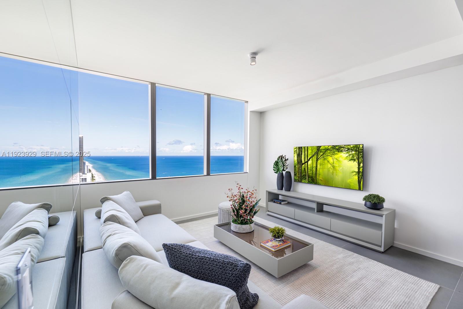 Excellent opportunity, price improvement on a half floor turnkey residence at a luxury boutique property just north of Golden Beach, with only 63 residences. This contemporary 40-story glass tower showcases panoramic views of the Atlantic Ocean and Intracoastal Waterway. Enjoy 180-degree views from sunrise to sunset with incredible panoramic views. The North residence features a private elevator landing with facial recognition, 24-hour concierge, and security. 3 bed,3.5 bath plus a Den with the best finishes. All Luadi doors, Boffi Kitchen and B&B Italia closets in the master bedroom.