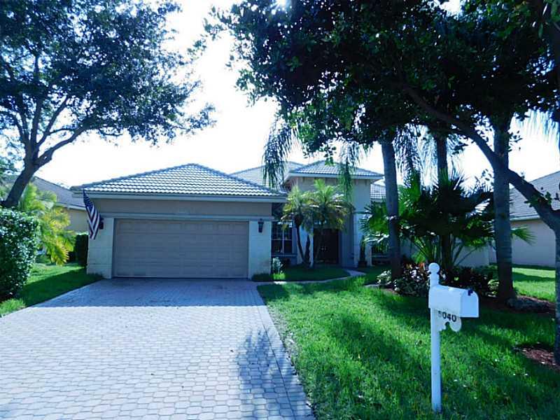 Updated 4 Bedroom plus Office, 3 Baths, 2 Car Garage, Pool Home on peaceful lake in Gated Community in Coral Springs. All New Dishwasher, Glass Top Range, Microwave,Washer, Dryer, Hot Water heater, and recently installed two zone Central Air. Newly painte d with new carpet in bedrooms, high quality wood laminate in Living Room & Dining Room, Tile in main living areas. New 8 inch base boards. Chandeliers, Fans in Bedrooms. Accordion shutters, paver driveway, great curb appeal. Includes Pool & Lawn Service.