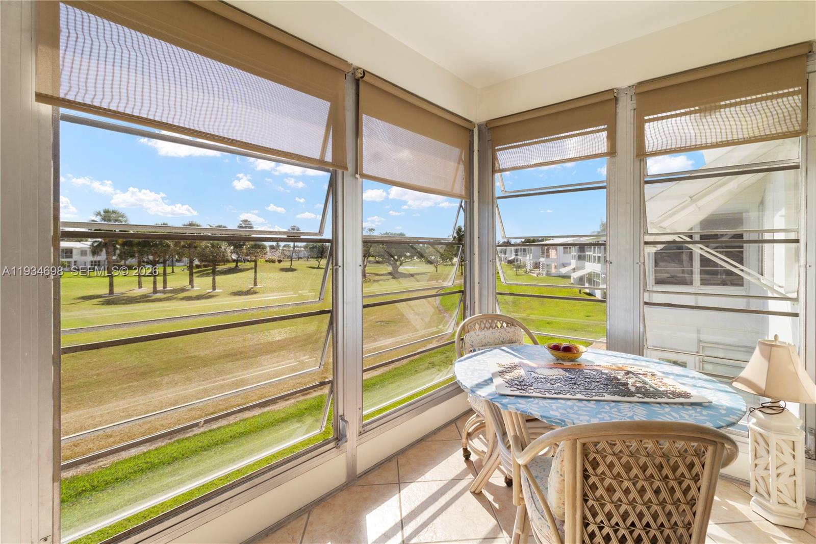 Charming Pompano Beach Golf Community 2/1 Condo on the Golf Course. Conveniently located across from N Clubhouse Community Center, heated pool and Leisureville office. This gem is located on the 9th hole with spacious views 55+ HOA/COA community and offers: Scheduled Shuttle Bus, Free Resident Golf on Par 3 Nine Hole Course, shuffleboard, library, game room, billiards. Large patio overlooking the golf course.NO LAND LEASE! Leisureville mandatory: 700 credit score, age restrictions of 55+, Cash only. Bldg termite tented 2018, Roof 2019