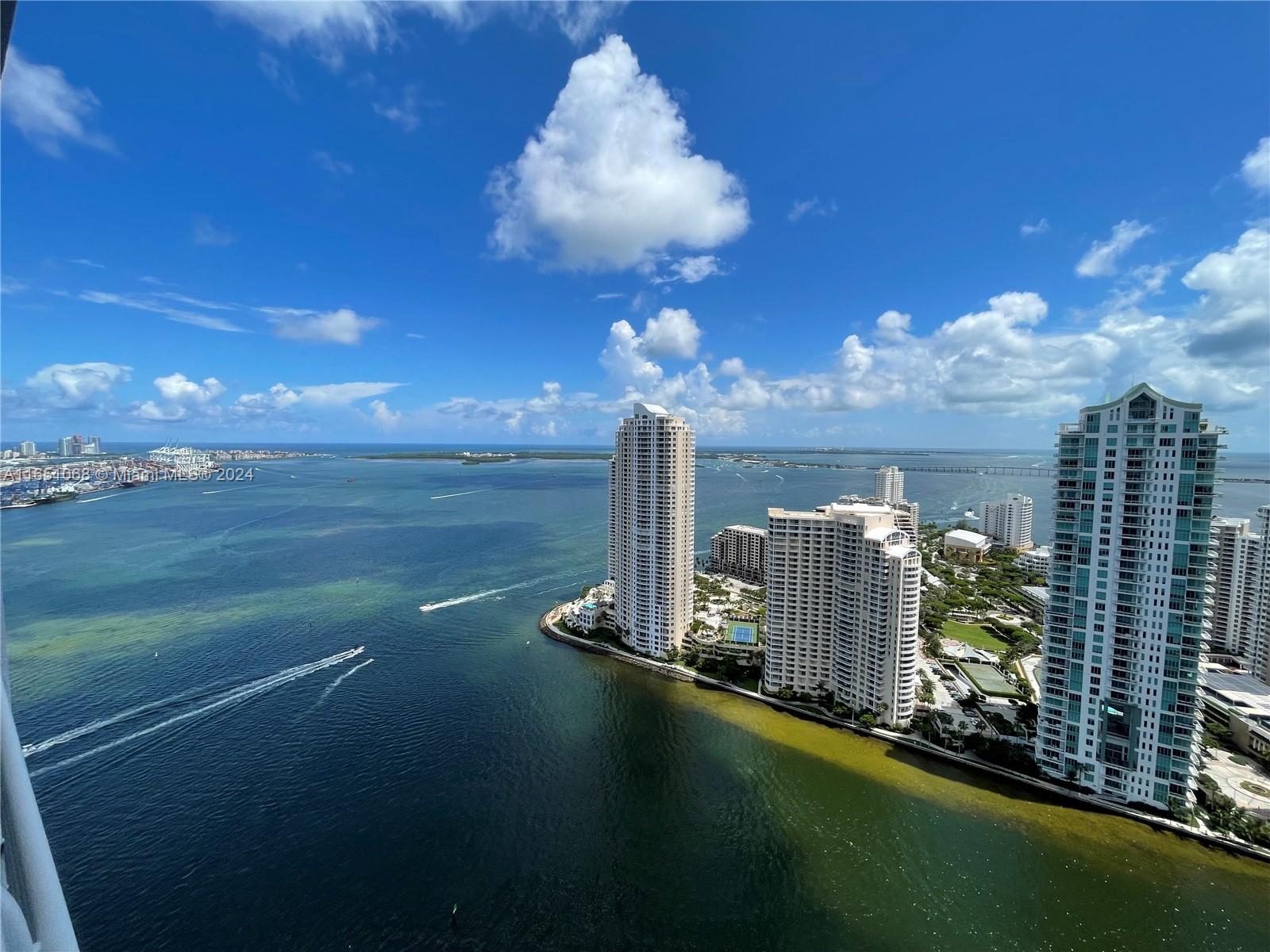 Welcome to luxury living at its finest in this beautifully remodeled penthouse with breathtaking views of Biscayne Bay and Brickell Key where the Miami River meets the bay.  No expense was spared remodeling this unit.  Custom Italian kitchen with top of the line appliances, including Miele induction cooktop.  Designer bathrooms and large porcelain tile throughout.  Large Electrolux washer/dryer.  Walk-in master closet.  Split bedroom plan.

One Miami is conveniently located a short walk from Bayfront Park, Metromover, Whole Foods, and all other downtown/Brickell shops and restaurants. Guard-gated building with 24/7 doorman.  Gorgeous lobby, multiple pools, gym, and other amenities make it as though you are living at a five-star resort.  Experience the ultimate in Miami living.