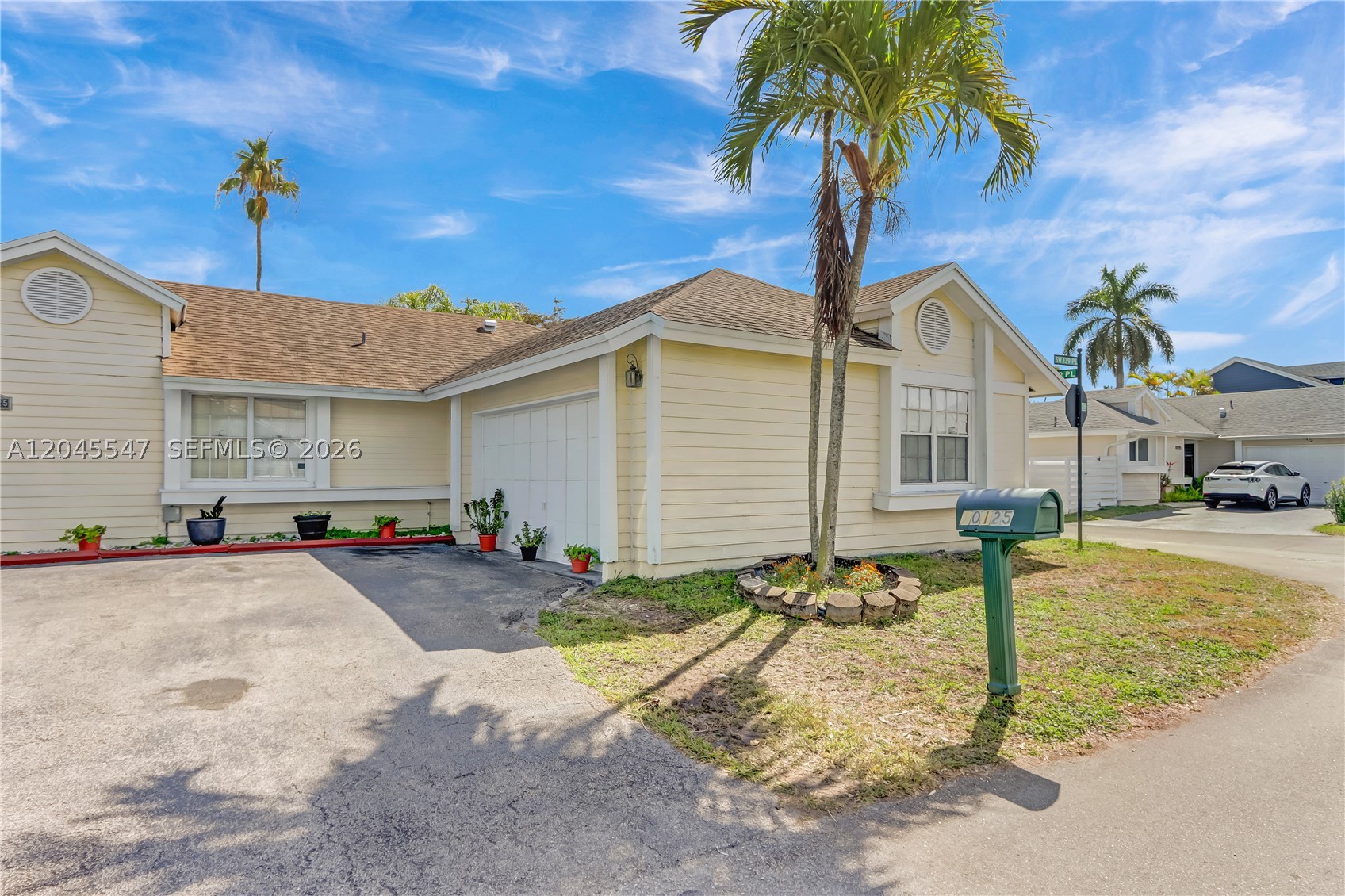 This beautifully maintained single-family home sits on a corner lot within the desirable Royal Glen community of Kendall and offers a spacious, flexible layout with well-separated living spaces. Inside, the home features two primary suites, each with its own en-suite bathroom, including one with a walk-in closet. The living and dining areas create an open and comfortable setting and connect to the patio through impact French doors, providing a welcoming indoor-outdoor flow. The kitchen is equipped with stainless steel appliances and renovated finishes. An additional room (no closet) provides flexibility and may be used as an office, den, or guest space. The home also includes a separate entrance suite featuring a full bathroom, kitchenette, and sitting area, allowing for adaptable use while maintaining separation from the interior living areas. Recent improvements include a roof approximately 5 years old and renovated kitchen and bathrooms. Conveniently located near major roadways, shopping, dining, and neighborhood parks, with easy access to everyday amenities throughout the Kendall area.