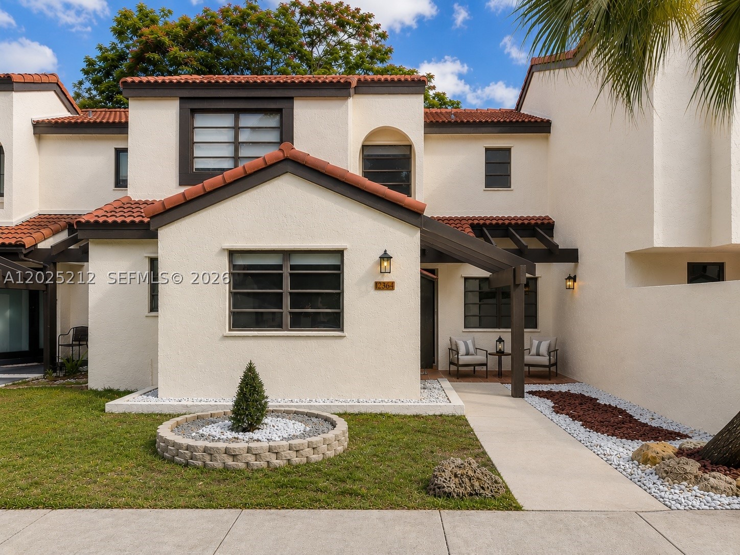 Back on the market due to buyer financing! Welcome home to this spacious three bedroom, two and a half bath townhouse with two reserved parking spaces in the Kenland Court community, where comfort, space, and convenience come together. Step into a bright and welcoming living area featuring soaring volume ceilings that fill the home with natural light and create an open, airy atmosphere. Recent improvements provide both value and peace of mind, including new laminate flooring, an updated electrical panel, a brand new roof, new stainless steel appliances, a new water heater and a freshly painted interior. The functional floor plan offers generously sized bedrooms, ample storage and a spacious first floor primary suite for added comfort and convenience. Enjoy seamless indoor outdoor living with a covered patio, perfect for relaxing or entertaining. Residents enjoy access to community pools and clubhouses, providing additional space to unwind, connect with neighbors, and enjoy the community lifestyle. Conveniently located near top rated schools, parks, shopping, dining and major commuter routes, this is the kind of home buyers walk into and instantly picture themselves calling home. Don't miss this second opportunity to own a move in ready home in one of Kendall's most established and conveniently located communities.