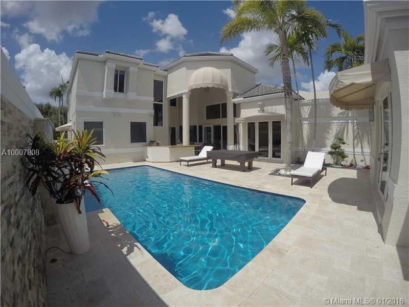 This beautiful luxurious home is located in a pretigious gate golf community, Weston Hills country club. It has an idependent guest house, five bedrooms, and five and a half bathrooms. This beautiful two story home also has a remarkable pool with a waterf all, and also has all marable flooring and impact windows with electric control blinds. This home that not only has a systematic music system, and security cameras all around the house has an outstanding view of a beautiful golf course.