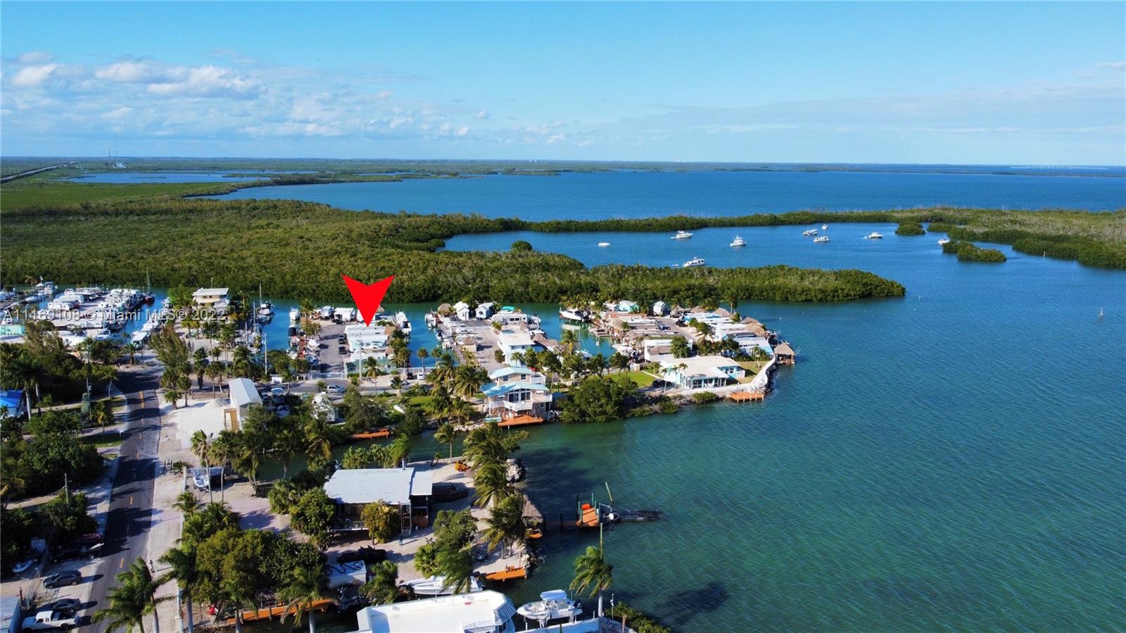 Own a piece of PARADISE in the Florida Keys! Waterfront RV Lot at Manatee Cove, WITH 20FT OF PRIVATE DOCK PLUS EASY ACCESS TO THE ATLANTIC OCEAN. THE RESORT HAS A PRIVATE SWIMMING POOL AND CONCRETE BOAT RAMP. CANAL FRONT LOT. . LOCATION IS ONLY 30 MINUTES FROM MIAMI AND NEAR GREAT FISHING SPOTS IN ADDITION TO LOCAL SANDBARS. CONSTANTLY SEE MANATEE IN CANAL. Legal daily Key Largo Rental allowed."THE PERFECT GET AWAY"