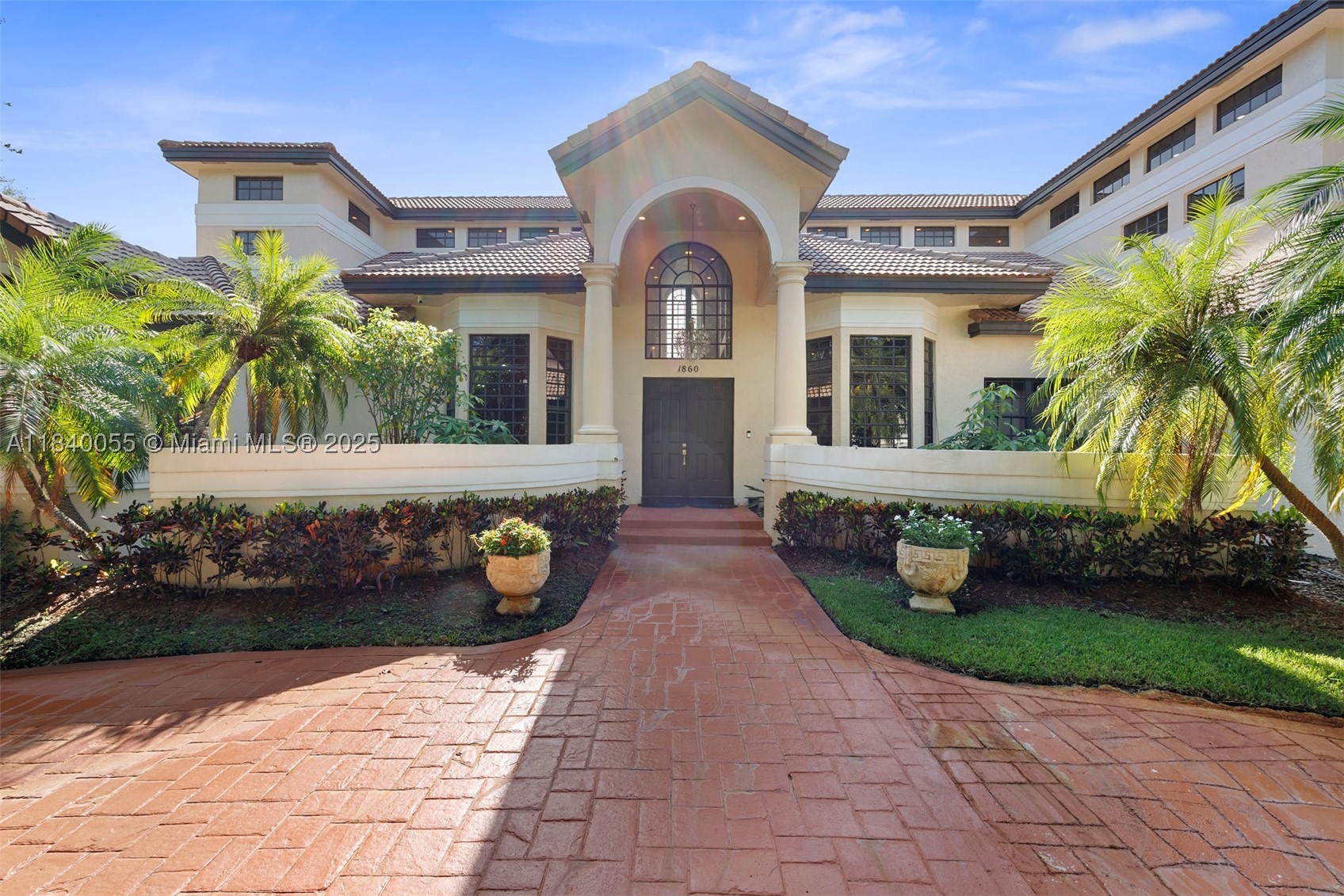 BRAND NEW ROOF – DECEMBER 2025. Experience one of Eagle Trace’s finest estates, ideally positioned within this prestigious gated golf community. Set on nearly an acre, this 8,000+ sq. ft. residence offers 6 bedrooms, 9 baths, and a 3-car garage, combining grand scale with refined elegance. Soaring 30-foot ceilings, marble floors, and abundant natural light create an impressive yet inviting atmosphere throughout. Designed for both everyday living and entertaining, the home features resort-style amenities including a heated pool and spa, sauna, steam shower, fireplace, and wet bar. A dramatic foyer with sweeping staircase opens to expansive living areas and a chef’s kitchen with granite countertops, oversized island, and Jenn-Air appliances. An upstairs loft provides the perfect space for a game room or media lounge.The grand primary suite is a true retreat with serene pool views, custom walk-in closets, and a spa-inspired bath with Jacuzzi tub, dual vanities, bidet, and separate shower. Circular driveway and ample parking enhance convenience and curb appeal.Located in the exclusive Eagle Trace Golf Club community, residents enjoy access to a championship 18-hole golf course designed by Ron Garl, lushly landscaped fairways, a stunning clubhouse, practice facilities, tennis courts, and an active social calendar. This rare estate offers luxury, privacy, and the ultimate South Florida golf lifestyle.