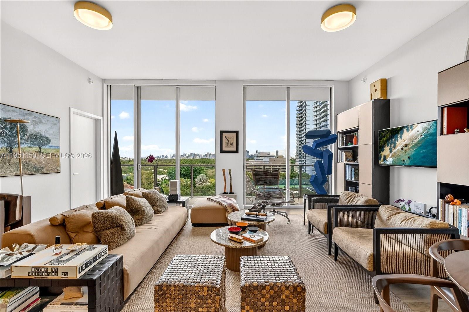 Located in one of Miami’s most sought-after neighborhoods, this move-in-ready residence blends the charm and scenic beauty of Coconut Grove with the contemporary elegance of Mr. C Residences. The designer kitchen features custom cabinetry, top-of-the-line appliances, and a center island ideal for entertaining or casual dining. This 2-bed, 2-bath, 1,187 sq. ft. home offers a bright, open layout with window treatments and large sliding glass doors leading to a private balcony with beautiful views, enhancing natural light and a sense of space throughout. Residents enjoy a full-service lifestyle with 24-hour security and concierge, outdoor pool and spa, fitness center and sauna, valet parking, garage access, and close proximity to excellent schools, parks, marina, shopping, and dining.