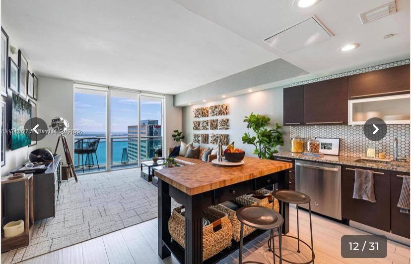 THE PLAZA 901 BRICKELL CO - Residential Lease
