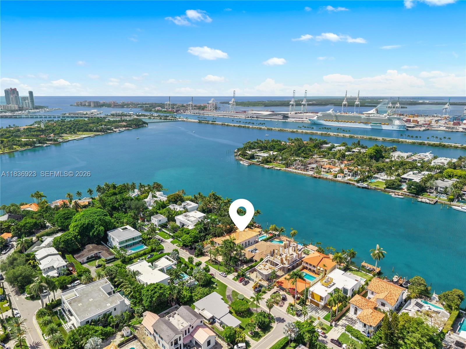 A rare opportunity to own a waterfront estate priced under $2,500 per square foot, offering compelling value relative to neighboring properties on Hibiscus, Palm, and the Venetian Islands. Located on coveted Hibiscus Island, this residence sits on 60 feet of prime waterfront with a private dock, this 6-bedroom, 5-bath residence spans 5,645 square feet on a 10,500 lot and is designed for both grand entertaining and everyday living. Features include a 2-car garage, elevator, soaring ceilings, chef’s kitchen, outdoor summer kitchen, and an expansive primary suite with two private balconies. Enjoy sweeping views of Star Island, the Miami skyline, and passing cruise ships.