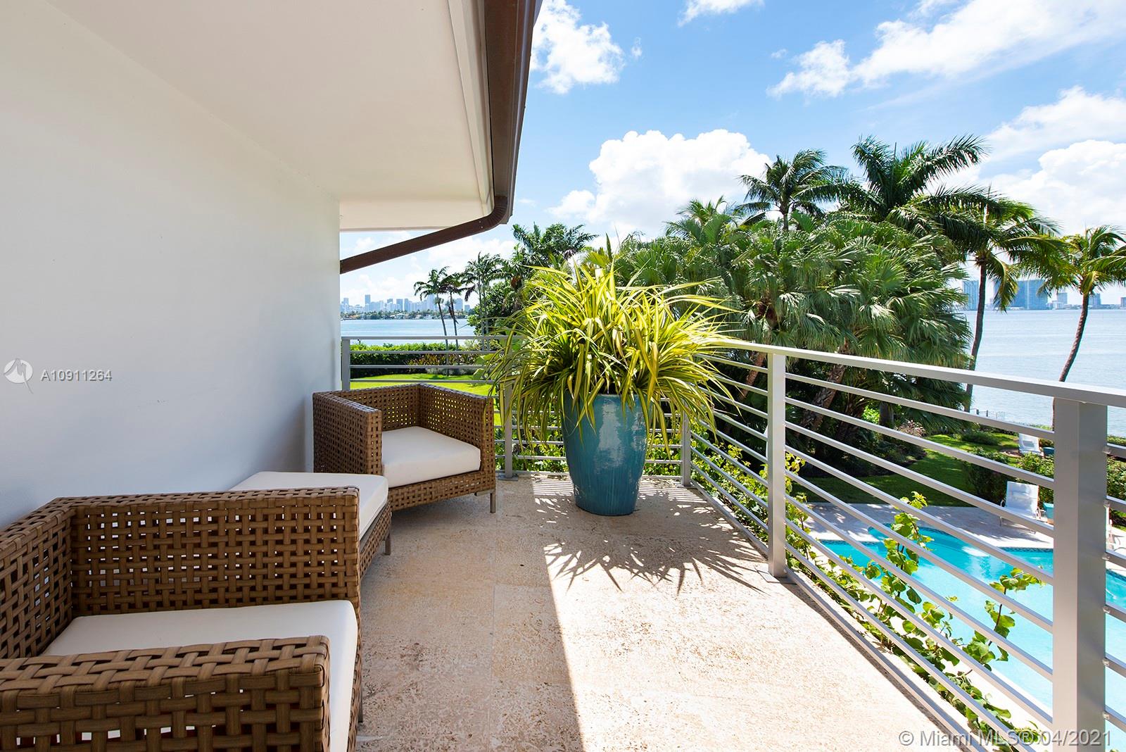 Located on the coveted and prestigious Gated Sunset Islands, this 'Art-Deco' inspired home offers majestic panoramic views of Biscayne Bay. Set apart by luxurious details and a unique contemporary style, you will marvel at sought after features like its custom stainless steel staircase, double-height ceilings escalating to 24 feet, and more! This 5 Bed / 5.5 Bath home also comes with a private dock, heated pool, home theater, and sits on 140 feet of water frontage. Conveniently situated near Lincoln Road, Sunset Harbor Shops, and high-end restaurants, you will be able to experience a true South Beach lifestyle at your leisure.
