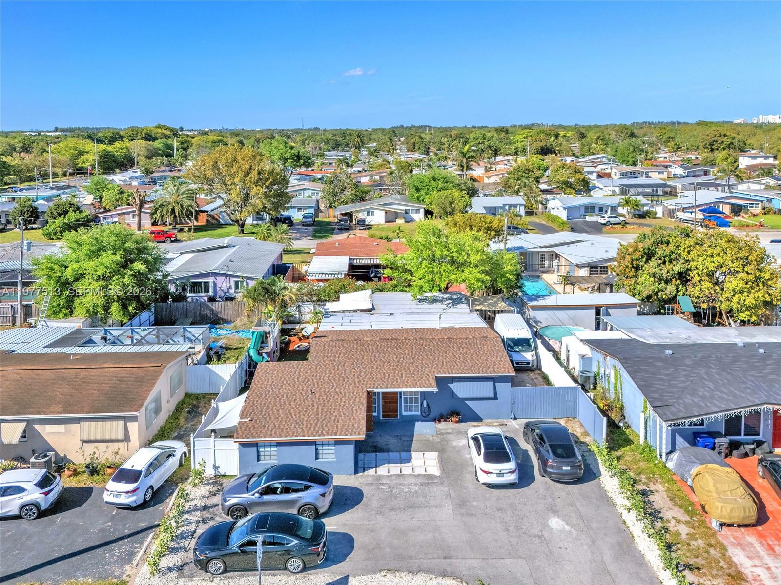 This single family home plus den and casita offers both comfortable living and excellent income potential, with an estimated rental projection of up to $62,400 per year. Renovated with over $100,000 in improvements, including a newer roof (2021), Newer A/C compressor, and septic system serviced within the past year. Situated on a 6,764 SF lot and elevated approximately 3 feet above street level. Features include a Florida room, utility room, porch, asphalt driveway, patio areas, and ample parking. Spacious backyard ideal for entertaining or relaxing