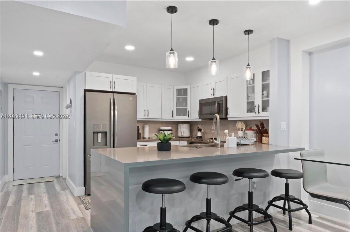 Prime Investment: Modern 2-Bed, 2-Bath Apartment w/ Pool View in Hialeah! This renovated 2-bed, 2-bath apartment is an investor’s dream in the heart of Hialeah! Enjoy a modern kitchen w/ stainless steel appliances, in-unit washer/dryer, & a spacious balcony w/ pool views. Located in a gated community, it offers a pool & assigned parking. With no rental restrictions, start earning income immediately in this high-demand area. Close to highways, shopping, dining, & schools, this unit is perfect for tenants. Modern upgrades & a pool view make it a tenant favorite. Don’t miss this high-ROI opportunity