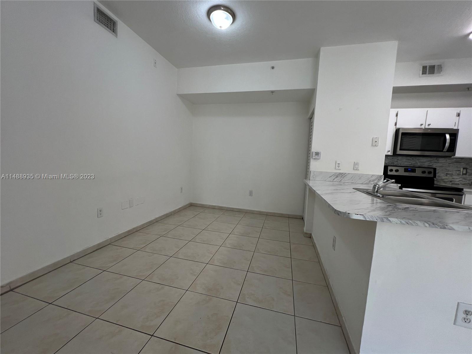 PALM GARDENS AT DORAL CON - Residential Lease