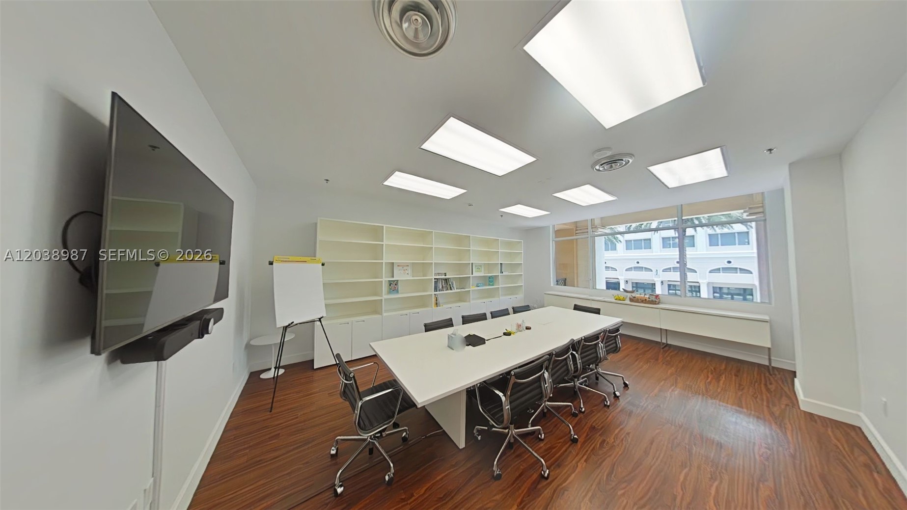 Turnkey office space in The Ponce de Leon Condominium building, 1 large and bright office, a large conference room, room with refrigerator and kitchen cabinetry for eating and relaxing, 1,369 square feet with lots of natural light because it has wall to wall windows facing north and west. 2 covered and gated parking spaces with 24 hour security system. It is truly a prestigious boutique mixed use building with concierge services and only 9 commercial offices on the second floor, built in 2008. Perfect for an accountant, title company, law office, support services, real estate office, architect office and any other professional office. Only 10 minutes (3.3 miles) to Miami International Airport!