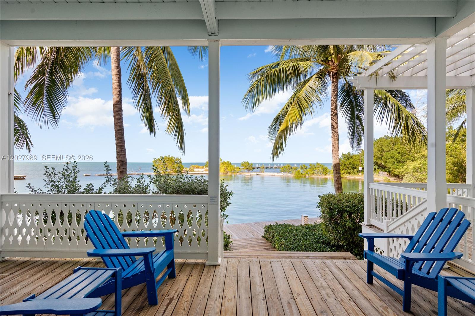 Looking for direct Gulf views, space, resort-style amenities, and strong investment potential? This direct gulf-front 3-bedroom, 2.5-bath townhome at Tranquility Bay Resort checks all the boxes. Set on open gulf waters in the heart of Marathon, it offers unobstructed views and a proven rental history--making it ideal as both a personal getaway and income-producing property. Enjoy sweeping water views from the main living area and private waterfront porch--perfect for coffee at sunrise or sunset cocktails. Sold fully furnished and turnkey, it's ready for immediate use or continued success in the resort's rental program. The main level features an open living and dining space, a well-equipped kitchen, half bath, and direct access to the balcony. Upstairs, the primary suite overlooks the bay with its own private balcony and ensuite bath. Two additional bedrooms, a full bath, and in-unit laundry provide plenty of space for guests. Tranquility Bay Resort offers two pools, a sandy beach, watersports, Butterfly Café, a beachfront tiki bar, and more. With a prime Marathon location and strong demand, this is a standout opportunity for both lifestyle and return. Call today!