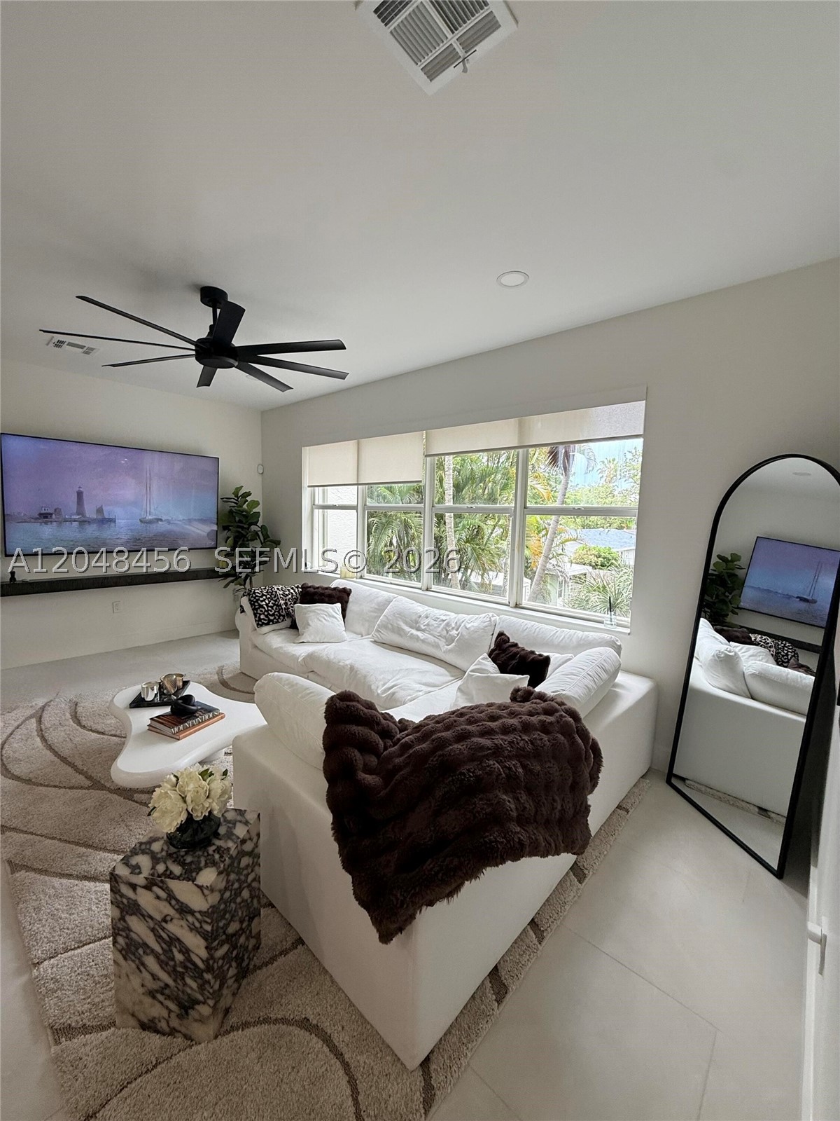 Beautiful Turn Key home ready for MOVE IN! One of the only gated communities, minutes from Downtown Fort Lauderdale, 10-minute walk to Las Olas and 10 minutes to the beach. LOCATION! TRV
A true 3-bed, 3-full-bath with 1-car garage and a turfed backyard opening to the community pool. Italian porcelain tile throughout, wood-look porcelain tile on the stairs, and natural light in every room. The kitchen shines with Taj Mahal quartz, a 10-foot peninsula counter, high-end stainless steel appliances, and a built-in wine cooler. Primary suite with dual sinks and two closets. Second bedroom with tub; third with a custom walk-in closet and en-suite shower. Brand-new: AC, Condenser, W&D, Water Heater and custom blinds throughout. Sold furnished or unfurnished. Brand New impact-glass front door.