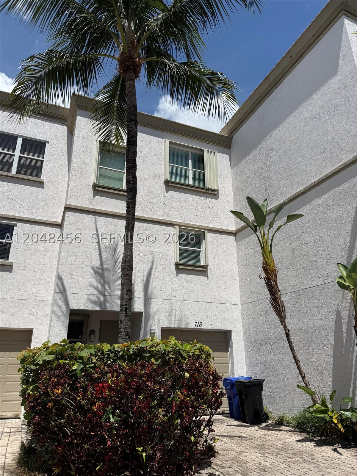 Beautiful Turn Key home ready for MOVE IN! One of the only gated communities, minutes from Downtown Fort Lauderdale, 10-minute walk to Las Olas and 10 minutes to the beach. LOCATION! TRV
A true 3-bed, 3-full-bath with 1-car garage and a turfed backyard opening to the community pool. Italian porcelain tile throughout, wood-look porcelain tile on the stairs, and natural light in every room. The kitchen shines with Taj Mahal quartz, a 10-foot peninsula counter, high-end stainless steel appliances, and a built-in wine cooler. Primary suite with dual sinks and two closets. Second bedroom with tub; third with a custom walk-in closet and en-suite shower. Brand-new: AC, Condenser, W&D, Water Heater and custom blinds throughout. Sold furnished or unfurnished. Brand New impact-glass front door.
