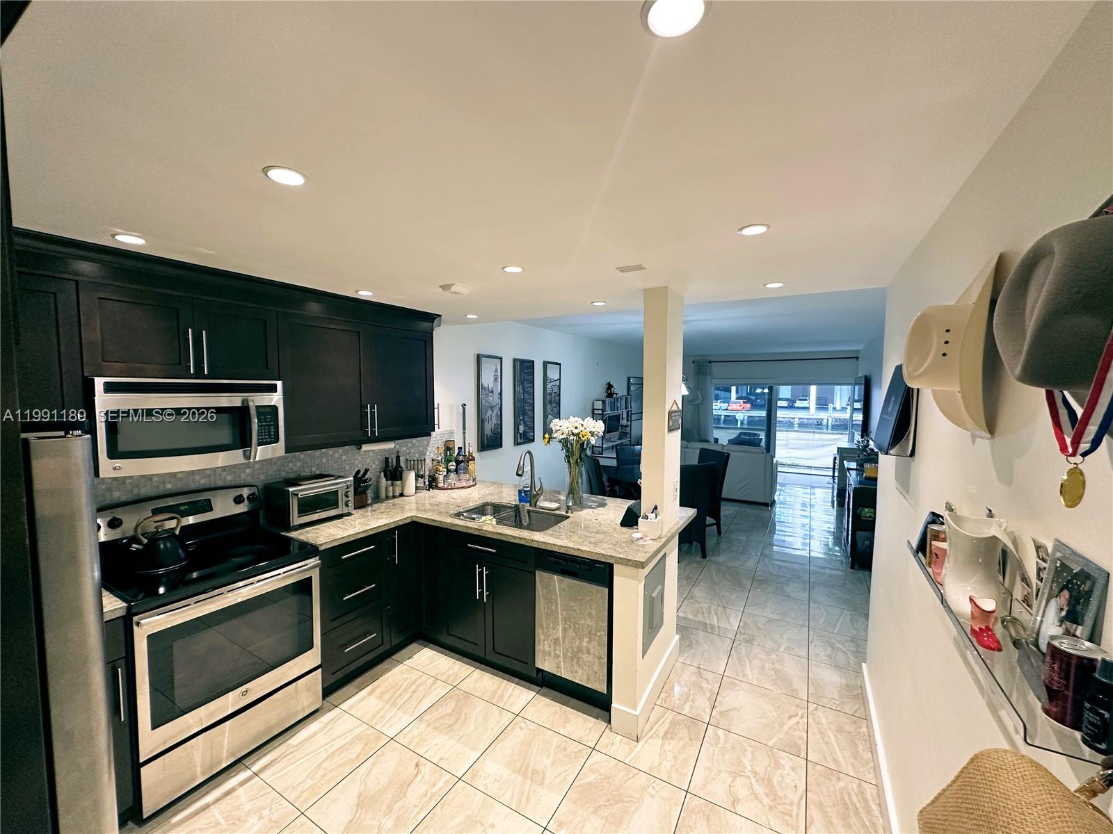 MILLION DOLLAR VIEW FROM THIS PARADISE ISLAND !! DIRECT ACCESS TO PATIO AND WATCH THE YACHTS GO BY. ALL TILED THROUGHOUT AND REMODELED INSIDE. COMMUNITY HAS HEATED POOL , BBQ AREA , SHUFFLEBOARD, EXTRA STORAGE ROOM AND A LAUNDRY FACILITY. MINUTES AWAY TO EVERYTHING FROM THE BEACH TO SHOPPINGS, RESTAURANTS AND CASINOS . CONDO FEES ARE $553/MONTLY. SMALL PETS OK. NO AGE RESTRICTIONS, CAN RENT RIGHT AWAY. EASY TO SHOW, JUST CALL LISTING AGENT.