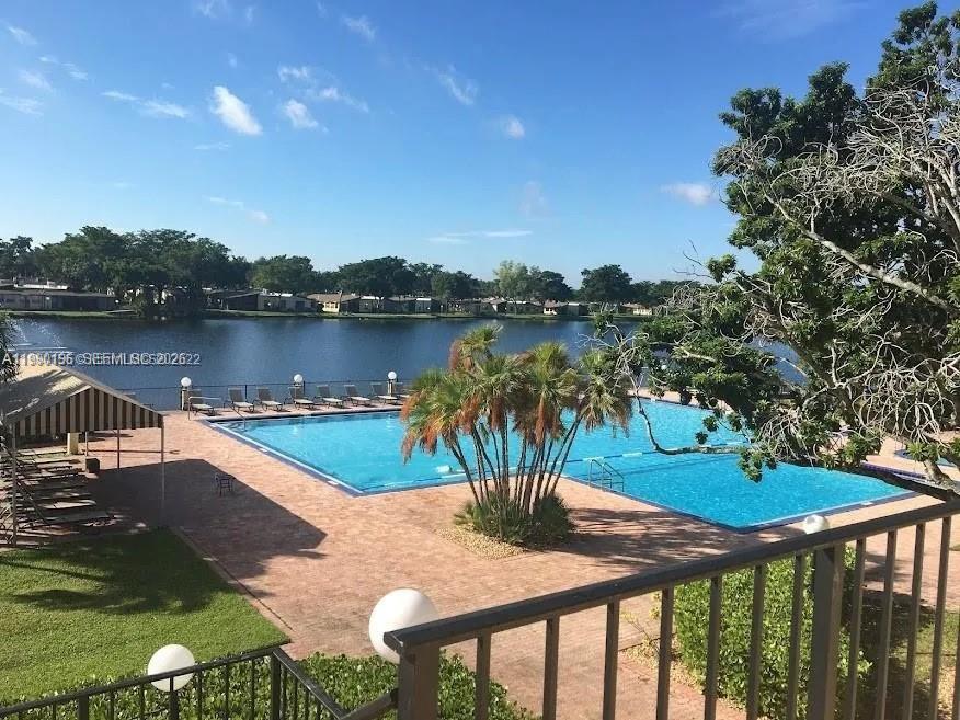 ***FLORIDA LUXURY LIVING AT AN AFFORDABLE PRICE FOR SENIOR CITIZENS  RETREAT IN THE GATED COMMUNITY OF  VILLAS AT CARRIAGE HILLS.***  ENJOY  RESORT STYLE AMENTIES  INCLUDING MULTIPLE POOLS, CLUBHOUSE, FITNESS CENTER, SAUNA, TENNIS COURTS AND BBQ AREA- TAILORED FOR AN ACTIVE ,LOW MAINTENANCE LIFESTYLE.** CONVENIENTLY LOCATED  MINUTES FORM FL-TURNPIKE, I-95 , SHOPPING, DINING,  ENTERTAINMENT, BEACHES  AND FLL INT. AIRPORT.*** MINUTES TO PUBLIX, FOOD TOWN , DUNKIN DONUTS, MCDONALD, TD BANK PIZZA ETC. LOWEST HOA $524.84 COVERS WATER, SEWER, TRASH, BASIC CABLE ,INTERNET, LANDSCAPING, BUILDING INSURANCE  AND SECURITY GATE ***  UNIT UPRAGED COUPLE OF YEARS AGO, STAINLESS STEEL APPLIANCES, MOLDING, BATH ROOM , KITCHEN, ELECTRIC OUTLETS,HURRICANE IMPACT WINDOWS,CHANDLIER, RECESSED LIGHTS IN THE KITCHEN, TILES IN  BALCONY, NEW FRAMHOUSE SINK AND  THE FLOORS.** . ENJOY  TENNIS COURTS AND THE LAKE VIEW  WHILE SIPPING A CUP OF TEA OR COFFEE FROM YOUR SREENED BALCONY . PEACEFUL AND TRANQUIL COMMUNITY FOR YOUR RETIREMENT. PRICED TO SELL  AND DON'T MISS THIS OPPORTUNITY IN  ONE OF HOLLYWOOD'S PREMIER 55+ COMMUNITYIES.*** EASY TO SHOW . CONDO IS VACANT AND READY FOR YOU TO MOVE IN ASAP.  SHEDULE YOUR PRIVATE TOUR  ONLINE TODAY.