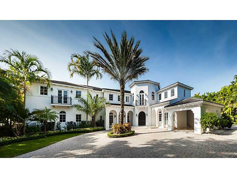 This masterfully designed estate is located in a beautiful gated community in the Grove. Situated on a builder's acre the home features spacious and bright living areas, walk-in wine cellar, home theater, 2 fireplaces, elevator, enormous master suite, lar ge bedrooms with huge closets, a great family room with built-in bar, and a gourmet eat-in kitchen. Enjoy entertaining on the covered patio with a summer kitchen, sparkling pool, and lush landscaping. Walk to the best schools, shops & restaurants.