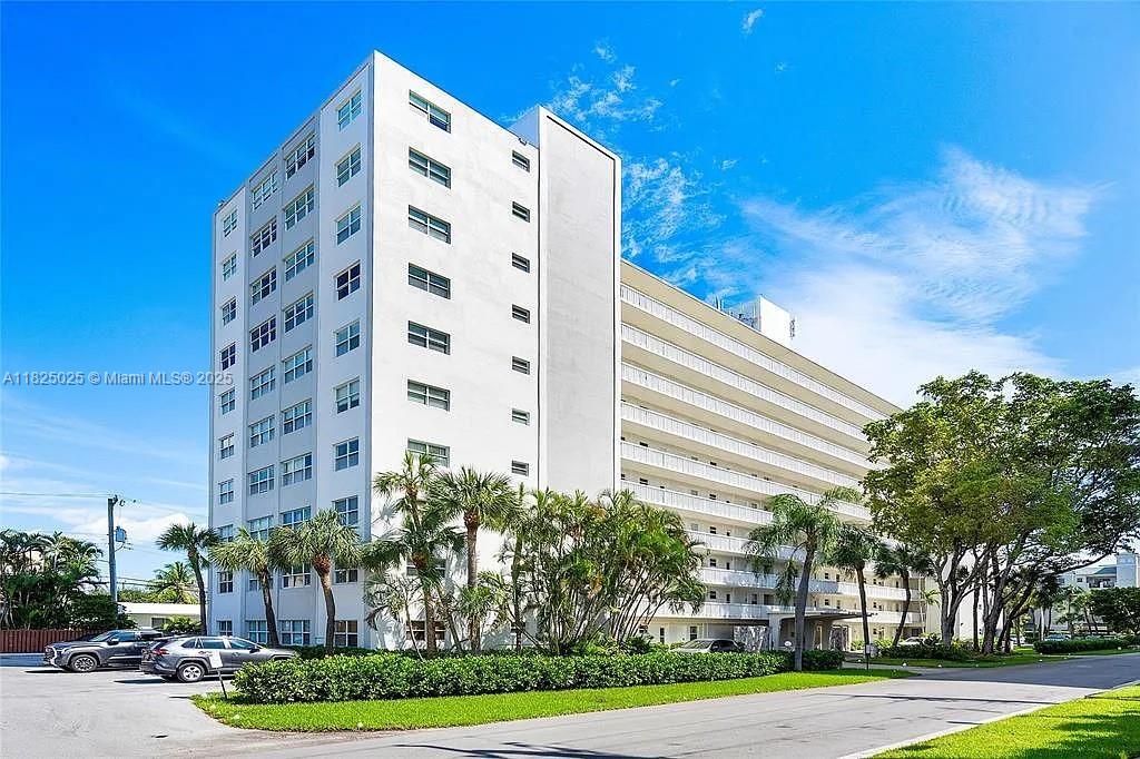 Rare find! LOCATION LOCATION LOCATION! The only 2-bedroom unit for sale in this desirable building! Beautifully renovated corner unit with prime northeast exposure in sought-after Coral Ridge. This bright 2BR/1BA condo features large bedrooms, a remodeled bathroom, modern glass-door closets, fresh paint, and stylish gray vinyl flooring throughout. Enjoy flat ceilings (no popcorn), new modern ceiling fans with remotes, and smart lighting and A/C system. Hurricane impact windows and doors, and the building has storage room, bike storage and a new 2025 roof! Pet-friendly, all-ages building with heated pool. Walk to the beach, Galleria Mall, Publix, Restaurants, and Birch Park. Located in the A+ Bayview Elementary School District. Rent right away! Perfect for investors or homeowners alike.