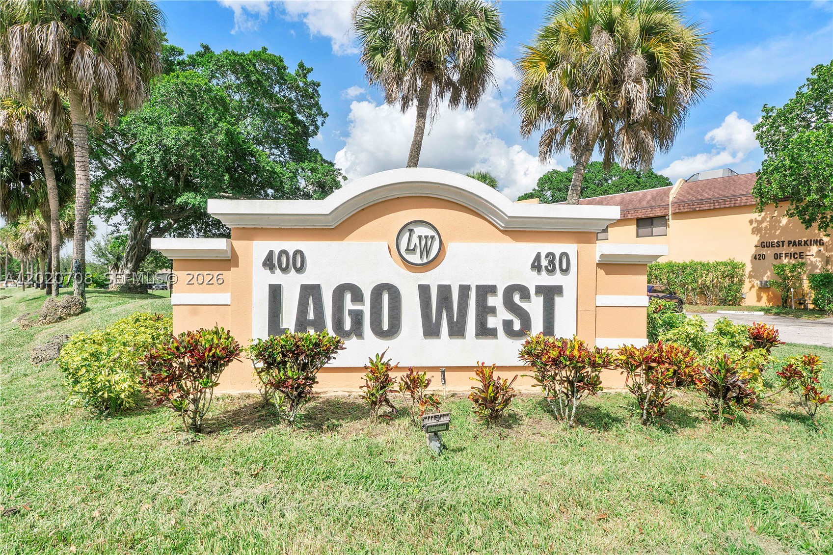 Come and see this light & bright, immaculate & spacious, 2 Bedroom 2 Full Bath second floor condo unit in popular Lago West in Plantation! Nestled within a gated community with no age restrictions, this unit invites you in with a lovely garden view, perfect for first time home buyers! The kitchen has warm wood cabinets with granite countertops and stainless-steel appliances with your own full-size washer & dryer. You will love the wood look tile flooring throughout the great room living area and bedrooms! Features Include: Updated master bathroom vanity area with new cabinet, lights, mirror, medicine chest. Updated guest bathroom floor, cabinet, lights, mirror, toilet and shower tile, newer A/C, New window & sliding glass door replaced along back over-looking green space and leading to patio. Also, for your protection complete accordion shutters. Enjoy plenty of closet space: walk ins, additional closets and a storage closet on the screened balcony. Amenities Include: a community pool, clubhouse, gym and tennis courts with assigned parking space and plenty of guest parking for visitors. Conveniently located only minutes from Sawgrass Mall, Fort Lauderdale Airport, Arena, grocery, restaurants and highways. Easy access to 595, 75 and Sawgrass Expwy.