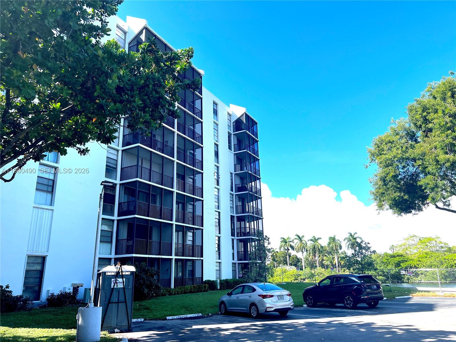 Nice apartment at Ensenada Condominium, in front of the Aventura Golf, panoramic views, screened balcony, 1 bedroom, 1 full bathroom plus 1 half, plenty of closet space, kitchen was completely renovated a year ago, new kitchen cabinets and stainless steel appliances, granite countertop. New AC installed in January 2026. Tile flooring throughout, 7th floor, one parking space. Currently rented to excellent tenant. You can rent from day one. Amenities include: pool, gym and lounge. One parking assigned and management office on site. This is a self managed association.